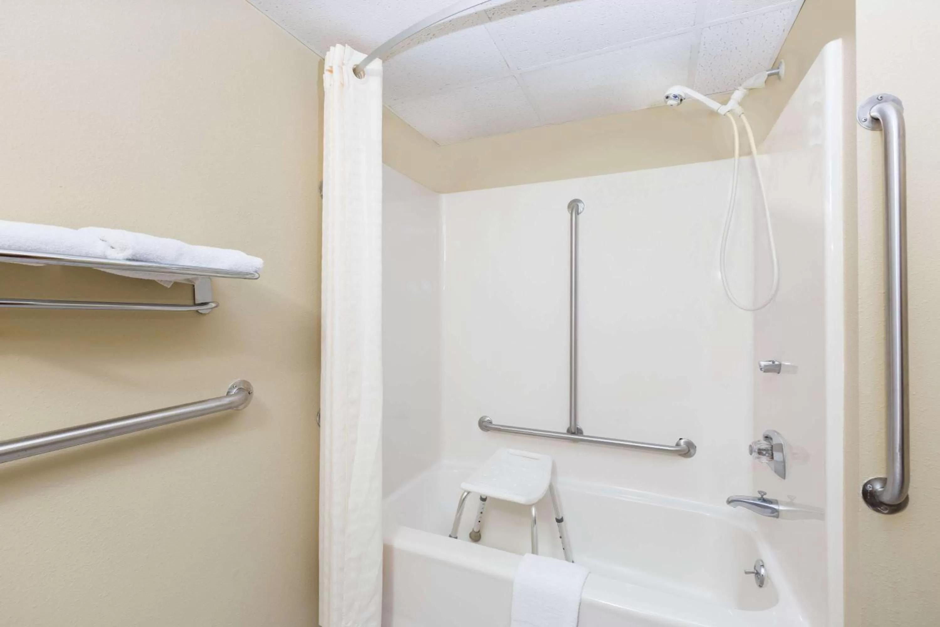 Bathroom in Super 8 by Wyndham Grinnell IA