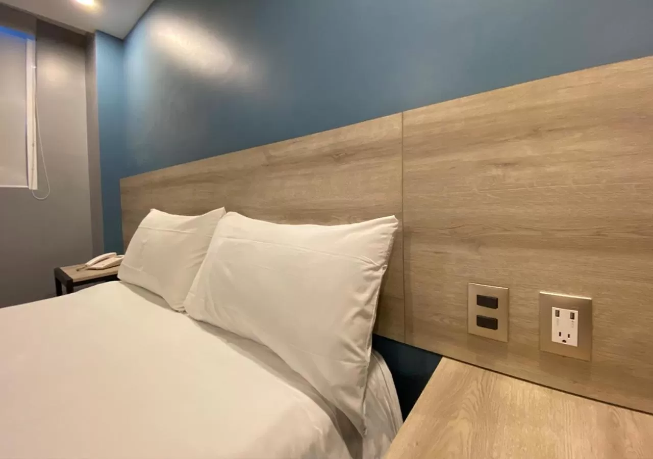 Bed in Hotel Estrella de Oriente