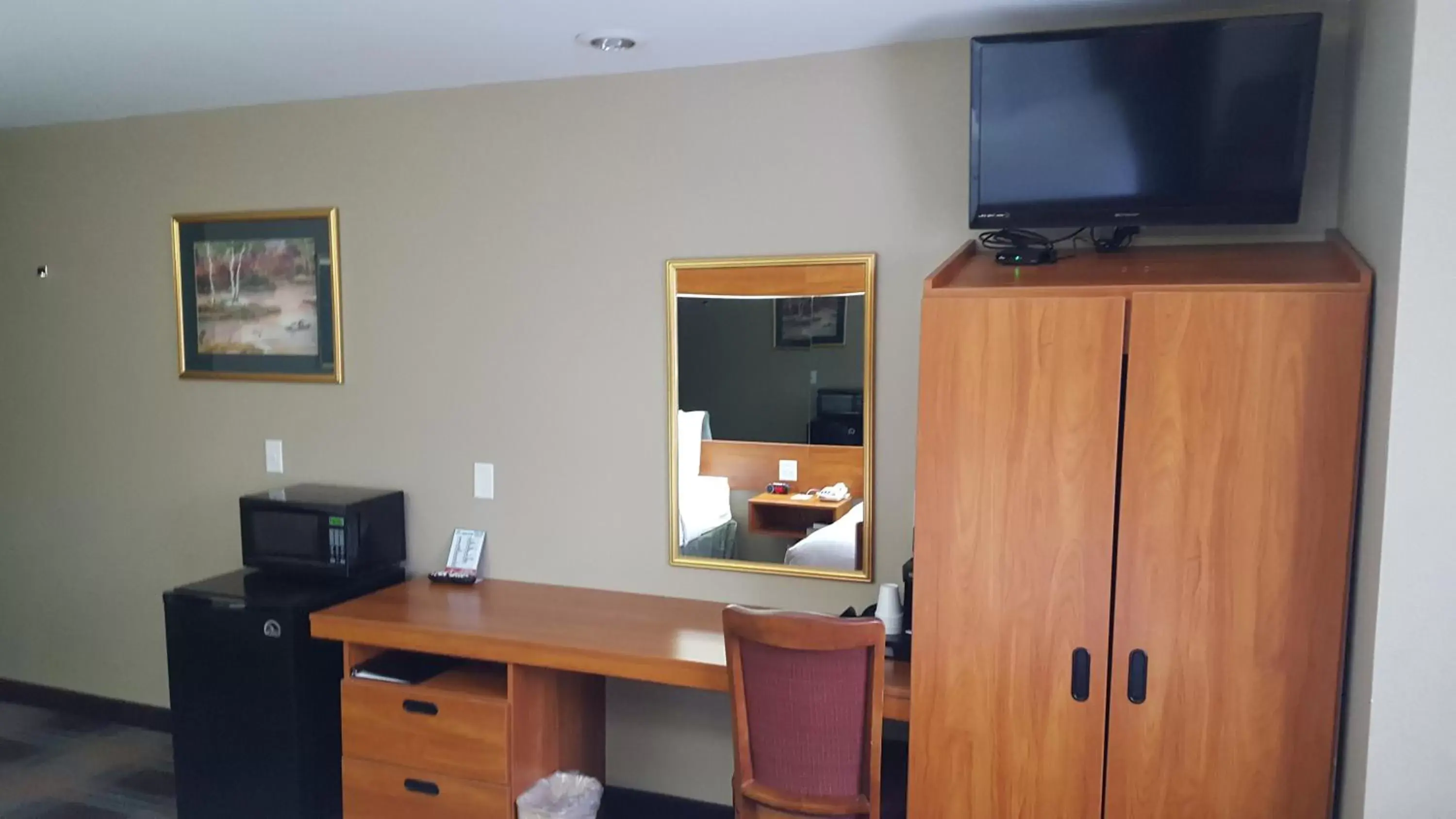 Photo of the whole room, TV/Entertainment Center in Microtel Inn & Suites by Wyndham Bozeman