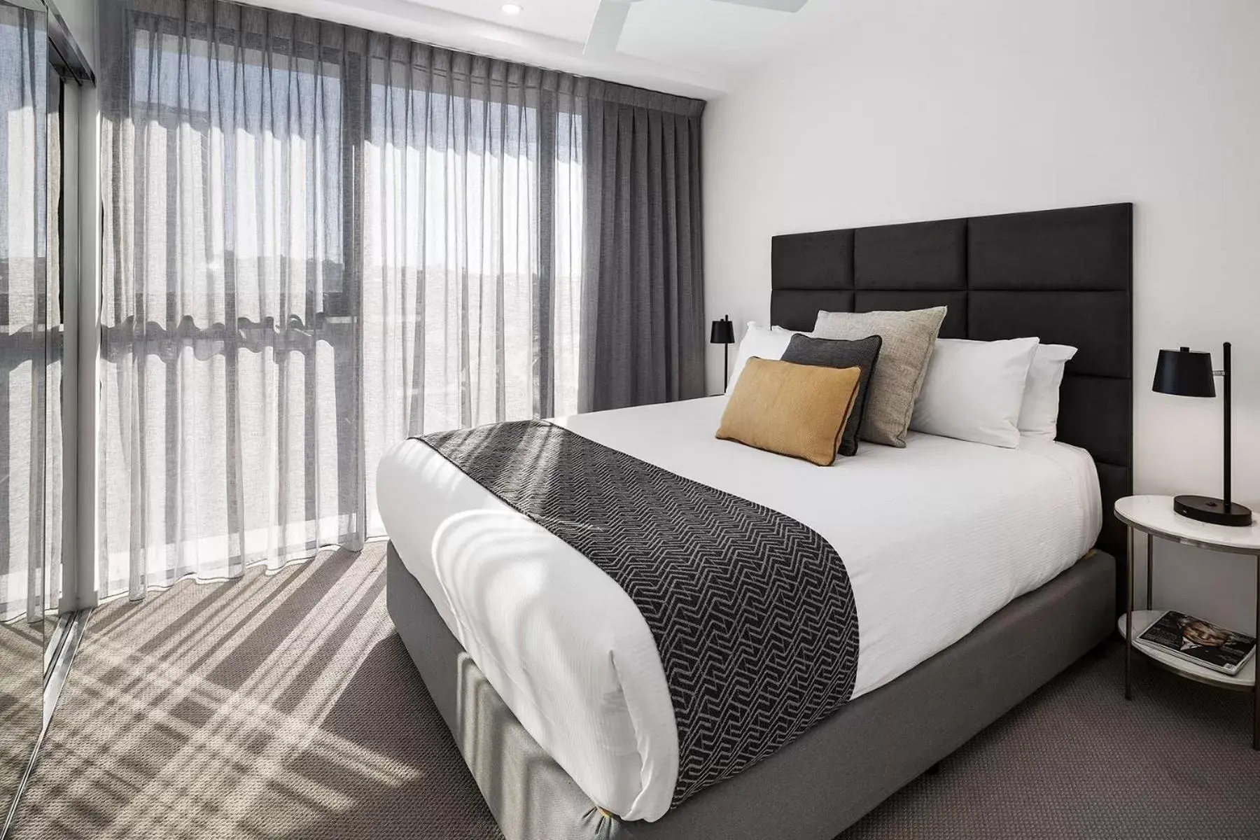 Bed in Alcyone Hotel Residences