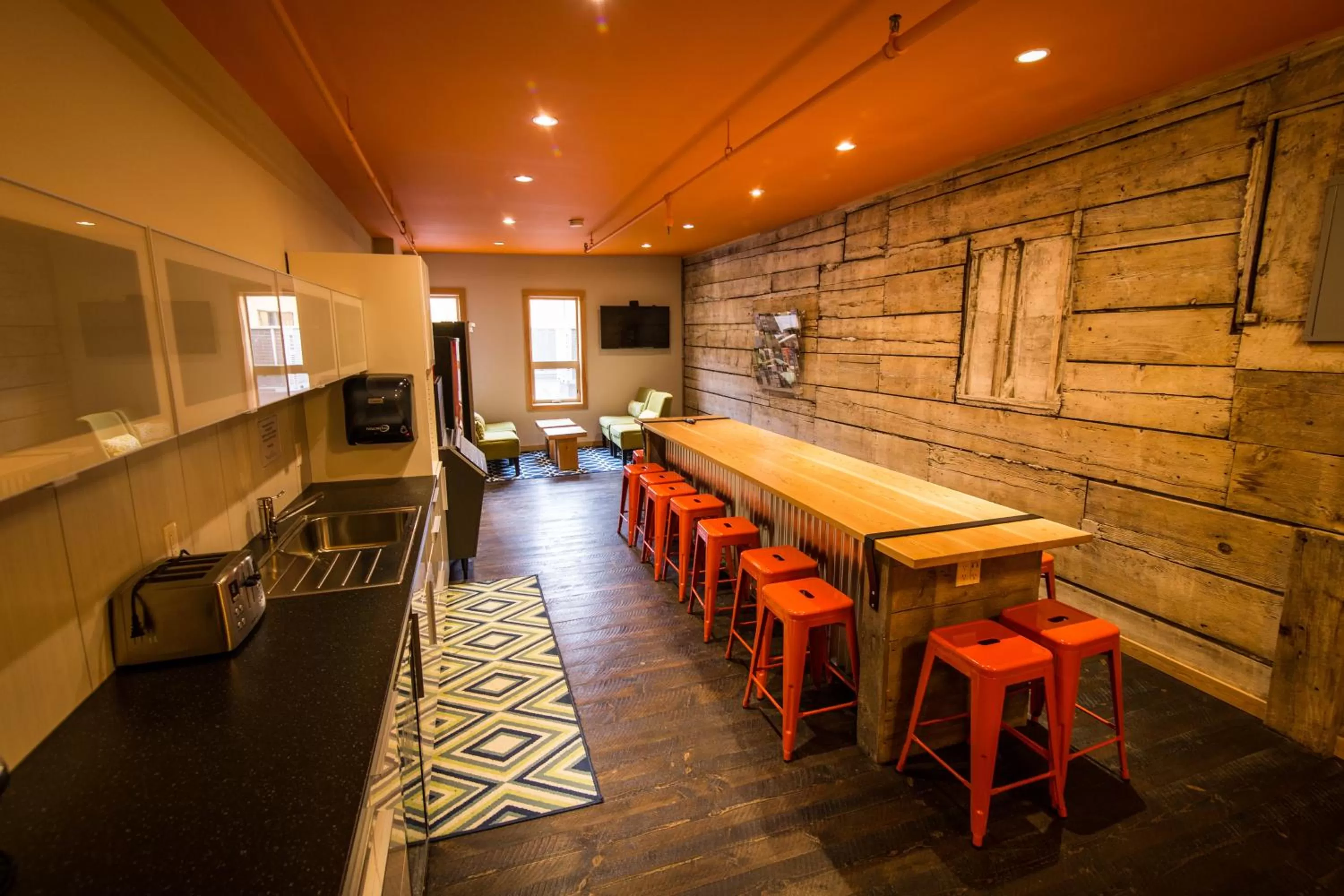 Communal lounge/ TV room in Adventure Hotel