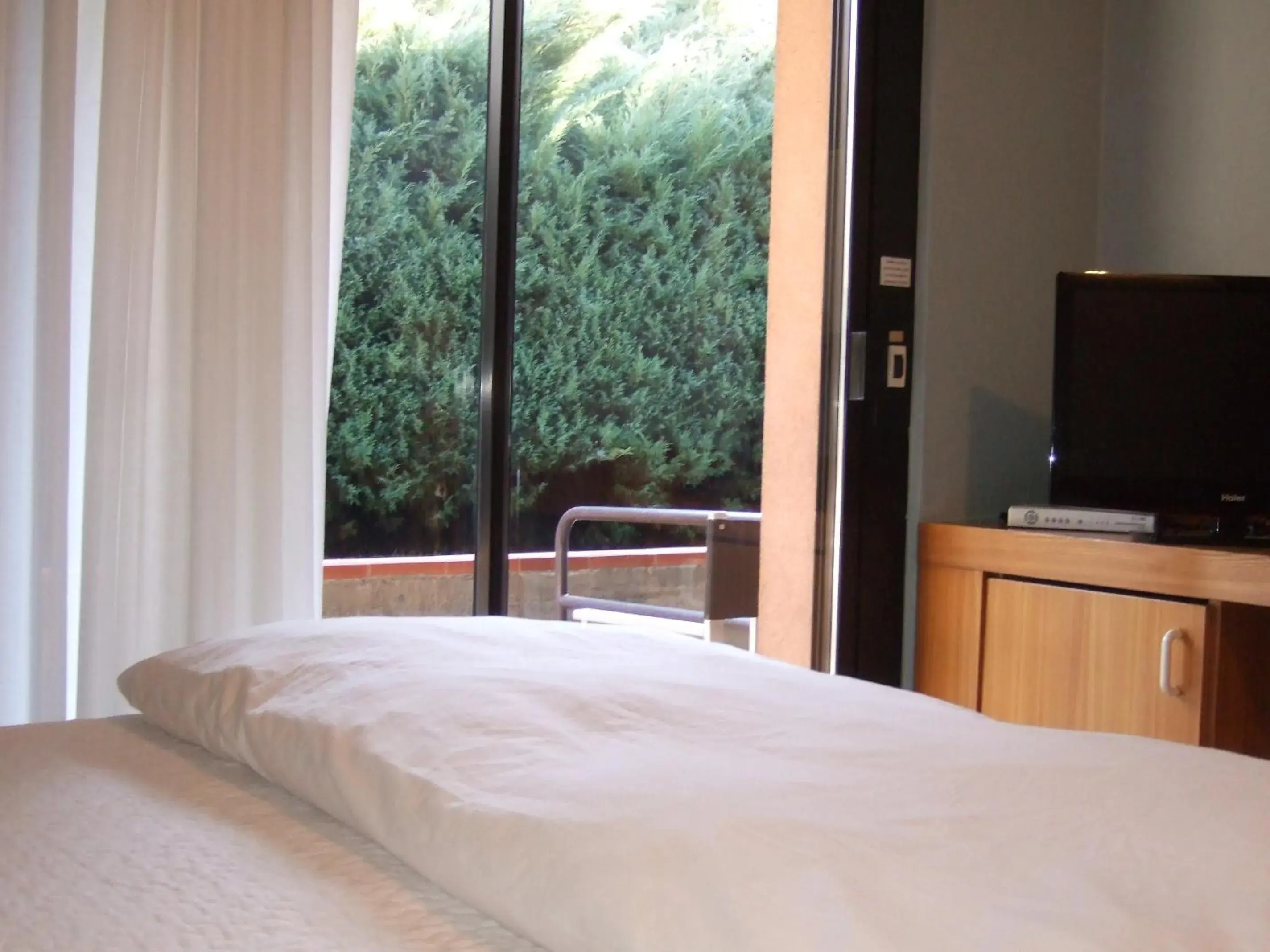 Bed in Hotel Canturio