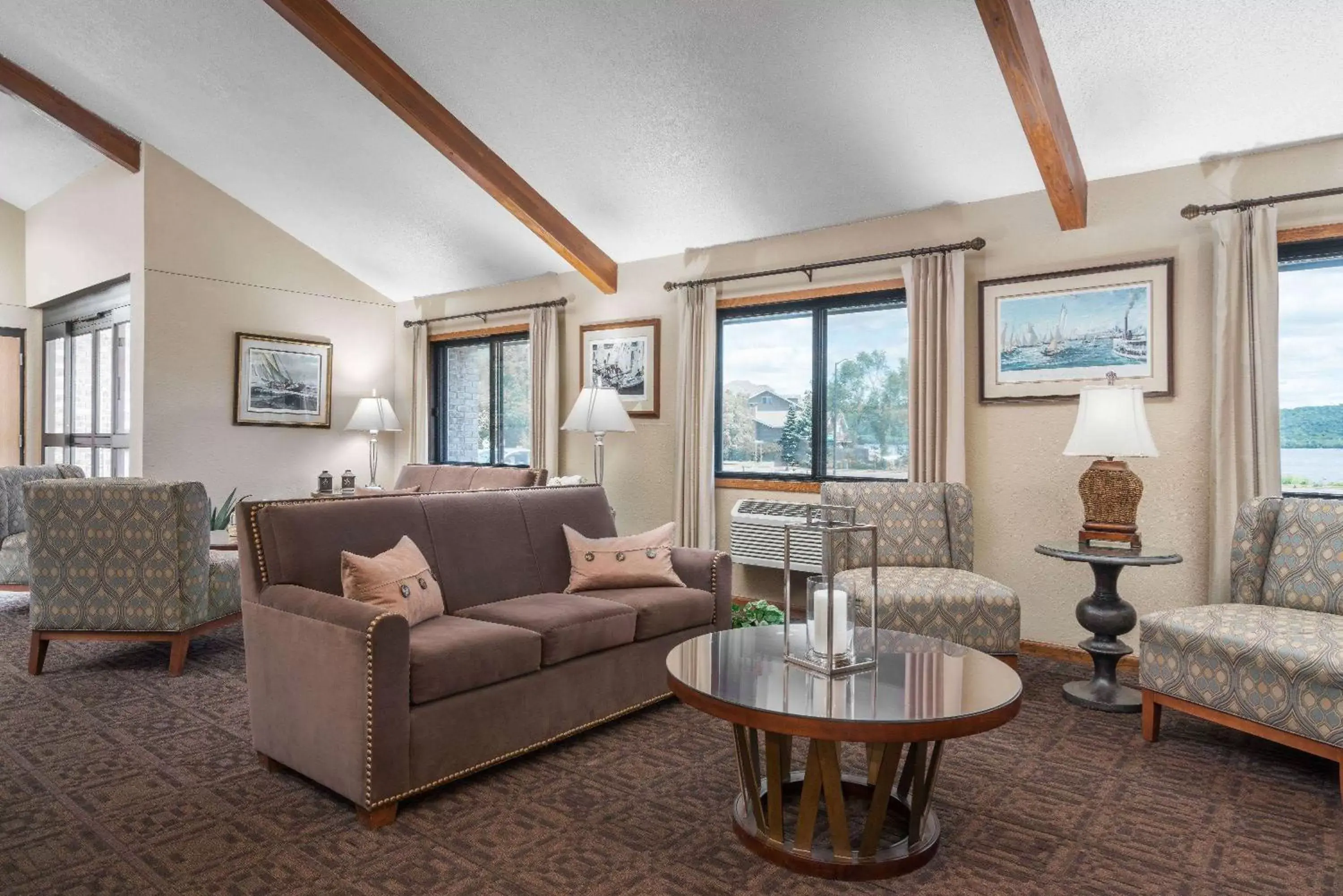 Lobby or reception, Seating Area in AmericInn by Wyndham Lake City