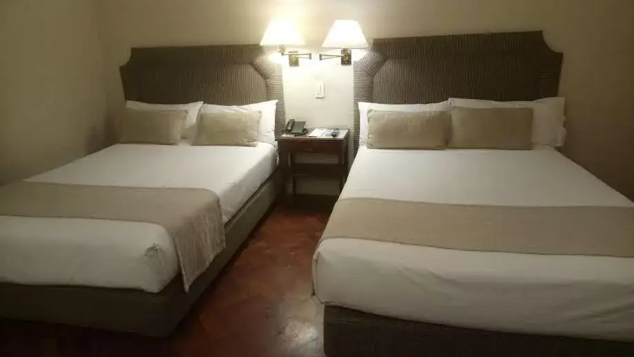 Bed in Lafayette Hotel