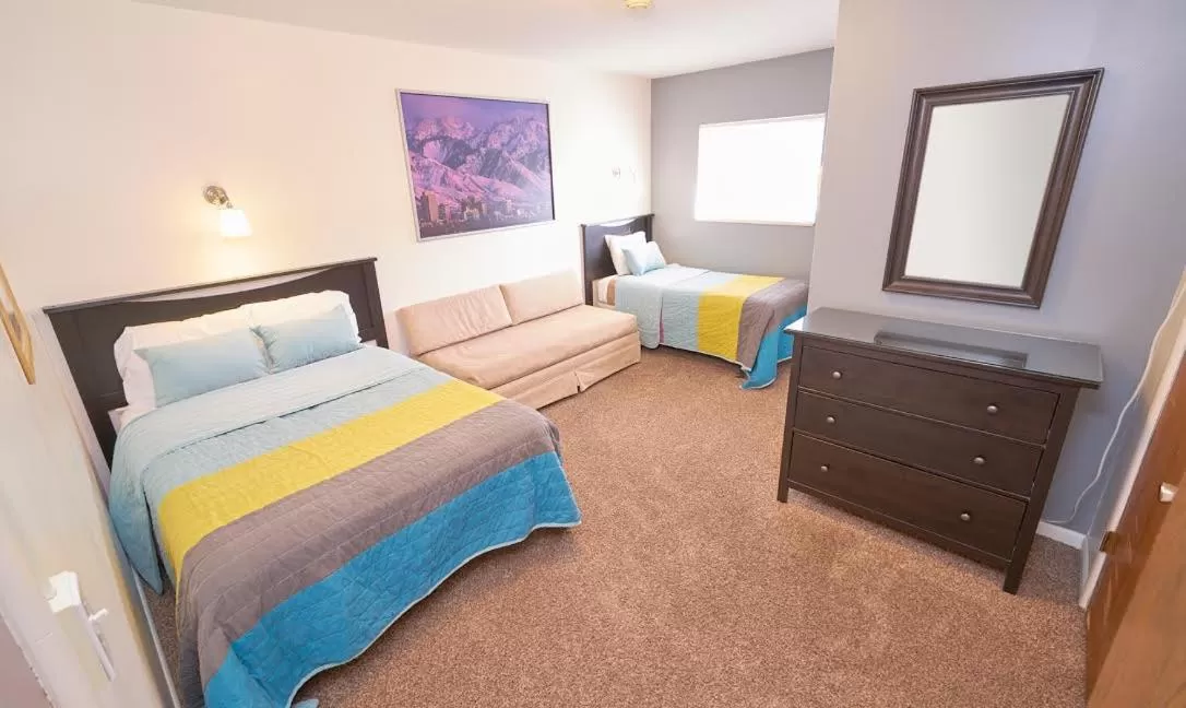 Bed in Chateau Apres Lodge