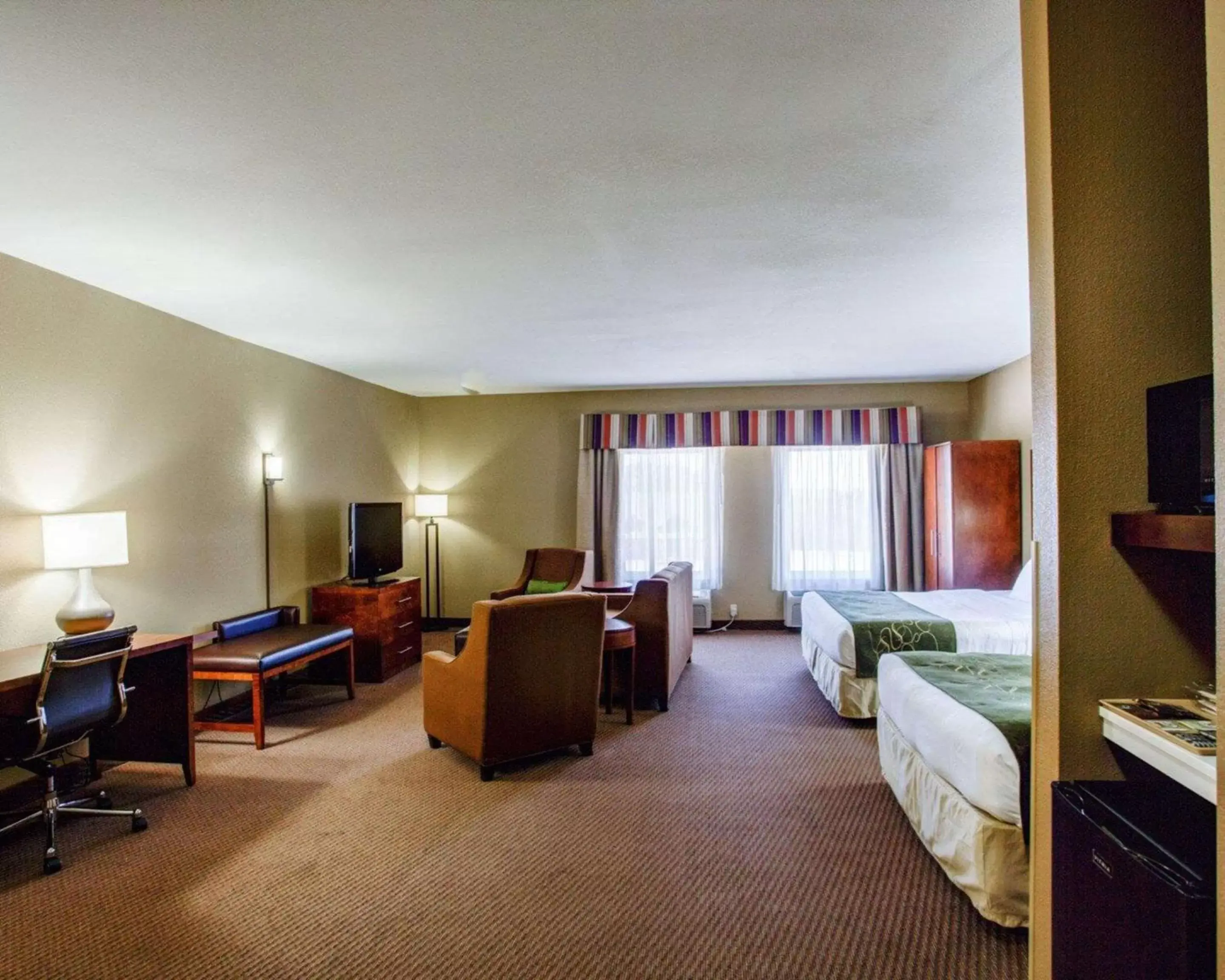 Bedroom, Seating Area in Comfort Suites