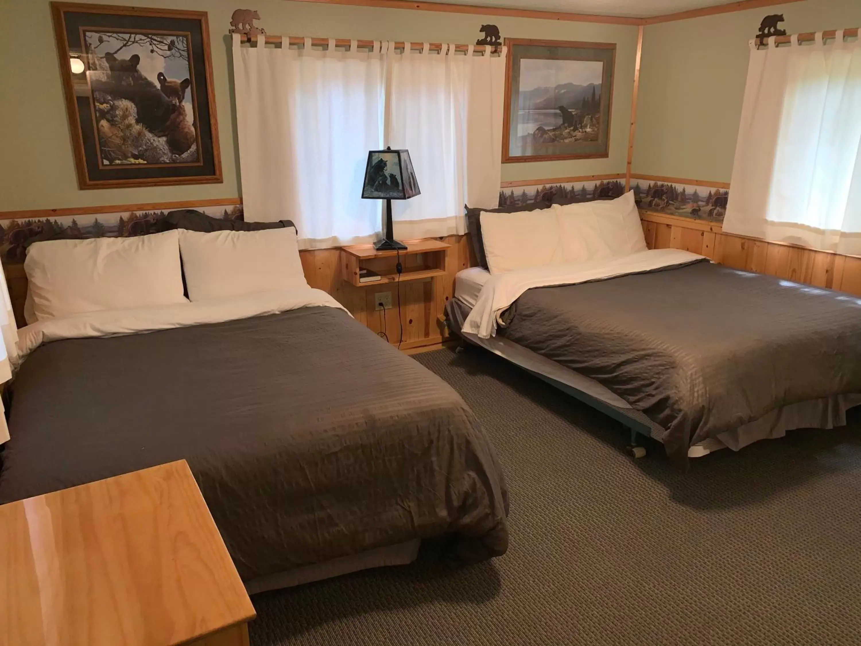 Bed in Glacier Haven Inn
