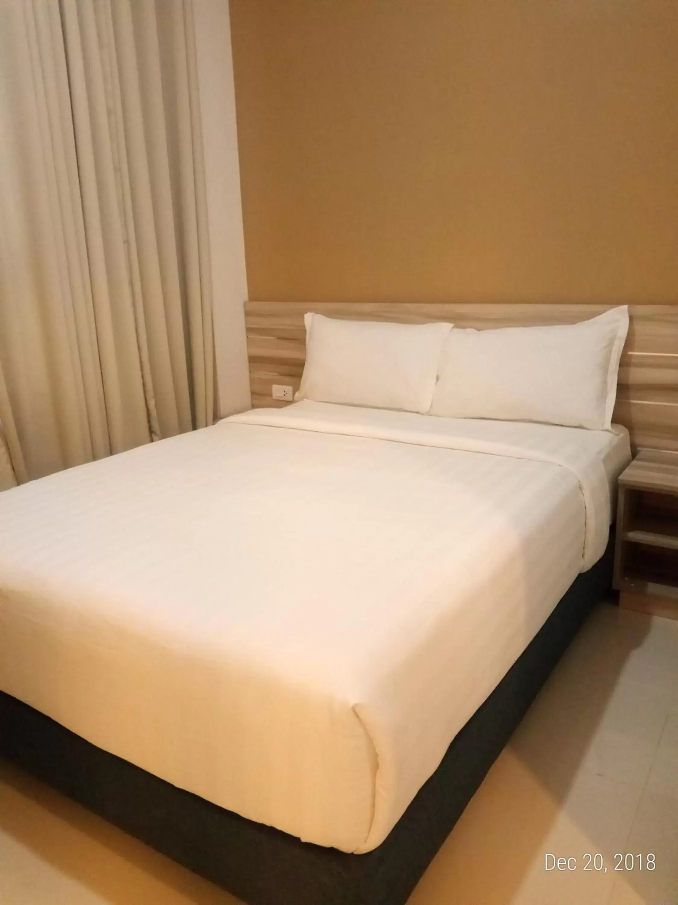 Bed in Figtree Hotel