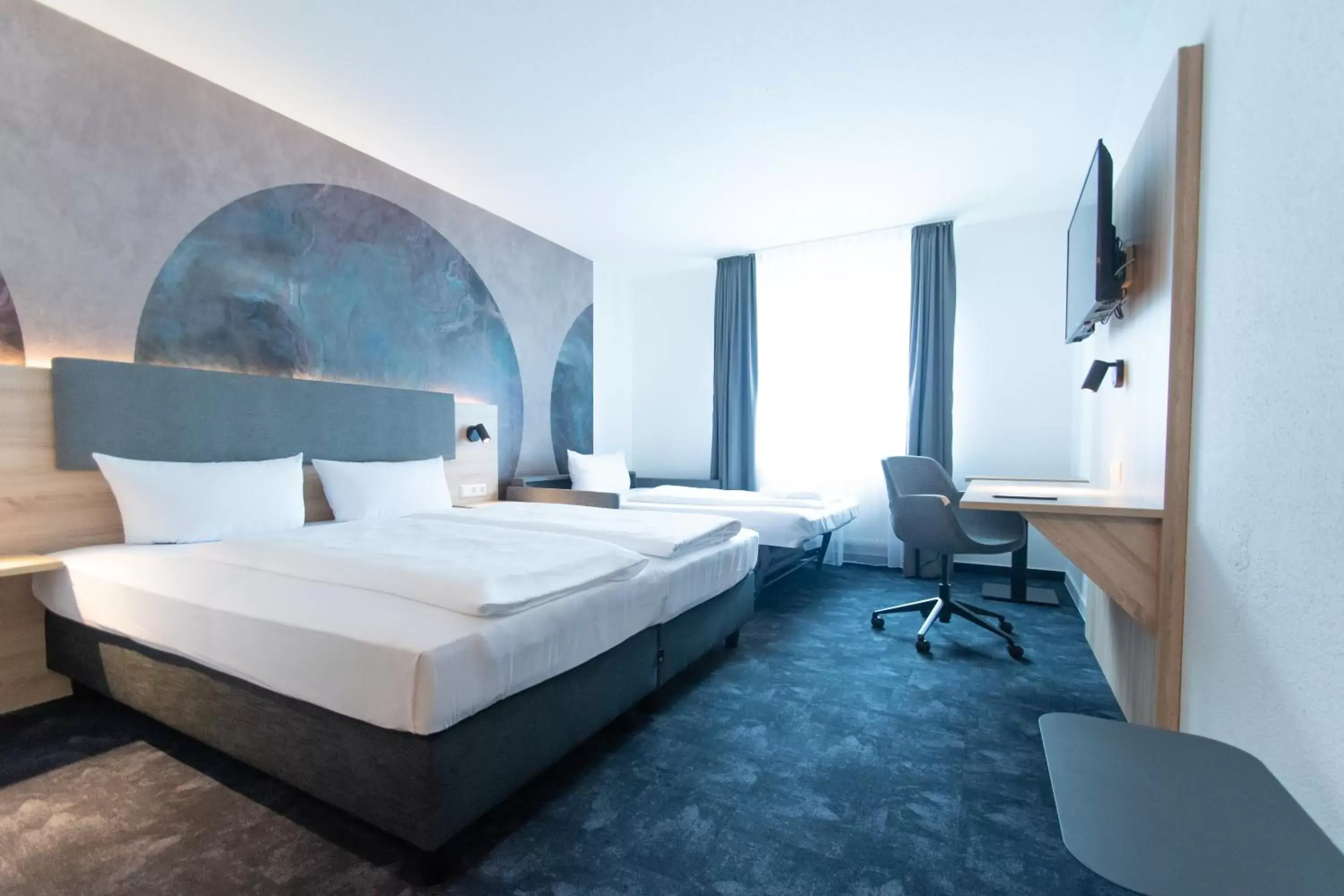 Photo of the whole room, Bed in Taste Hotel Jettingen