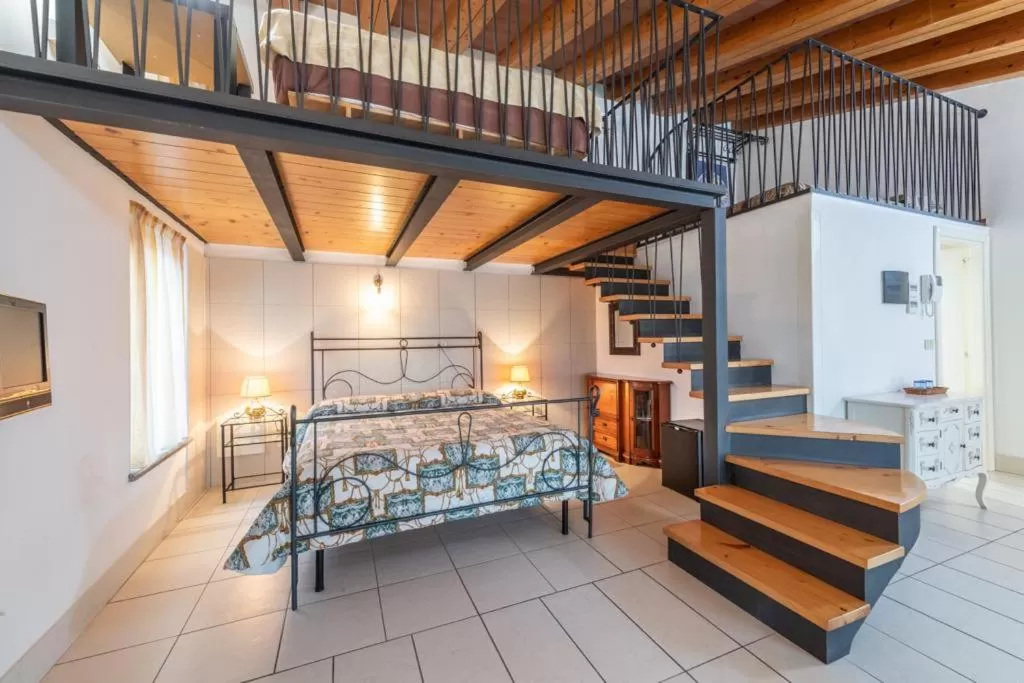 Bed in Le dimore Al Vecchio Teatro