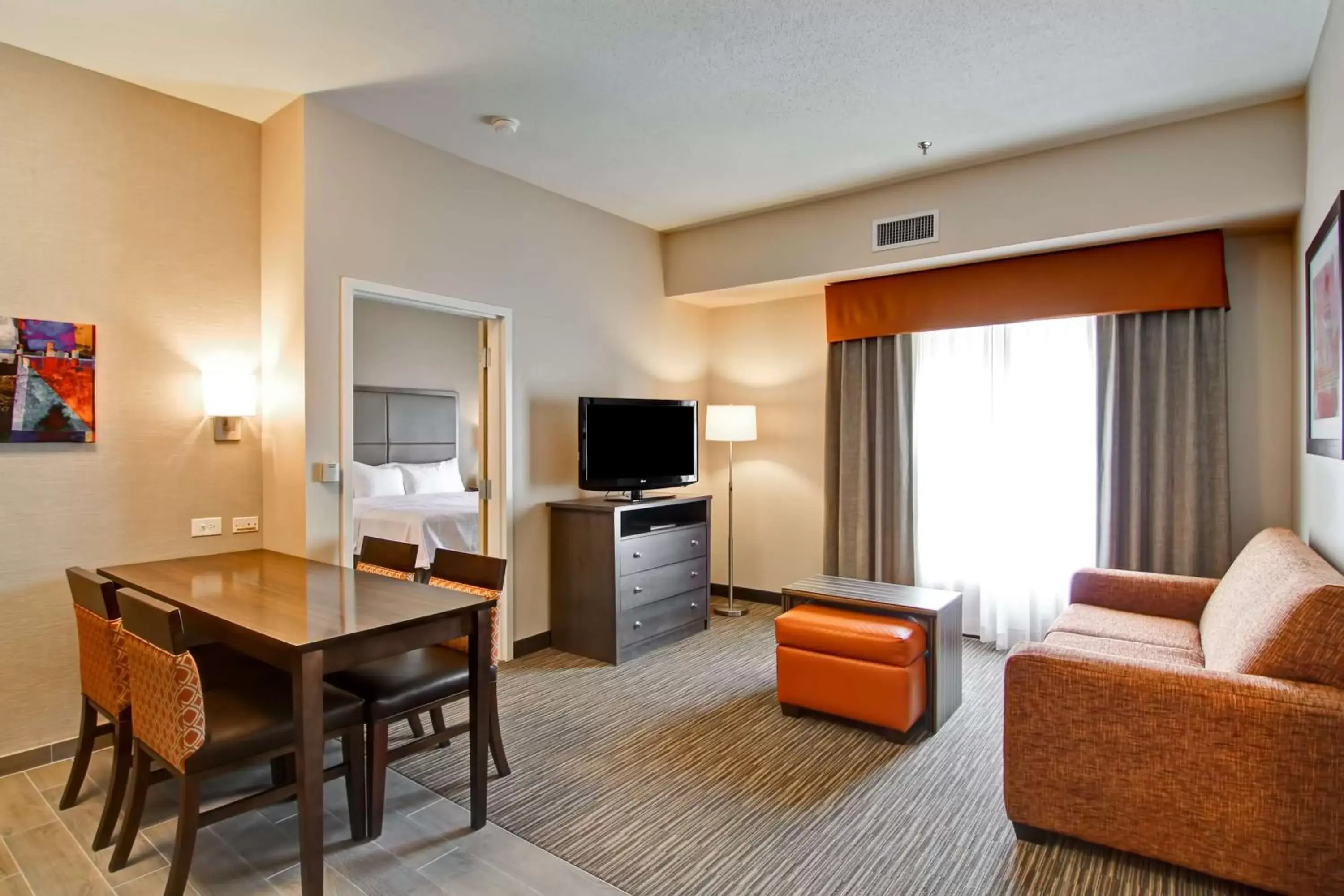 Living room, TV/Entertainment Center in Homewood Suites Houston Kingwood Parc Airport Area