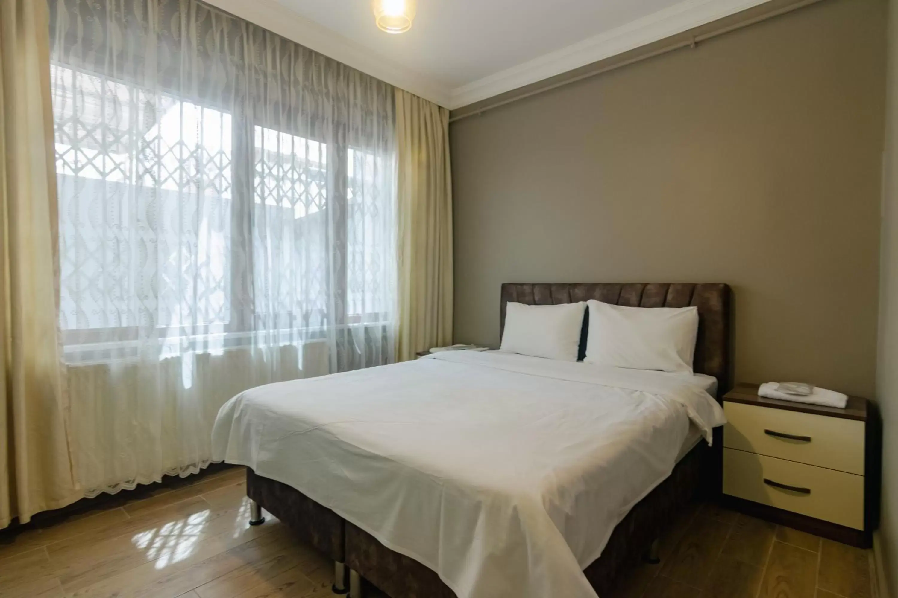 Bedroom, Bed in Zendy Suite Hotel