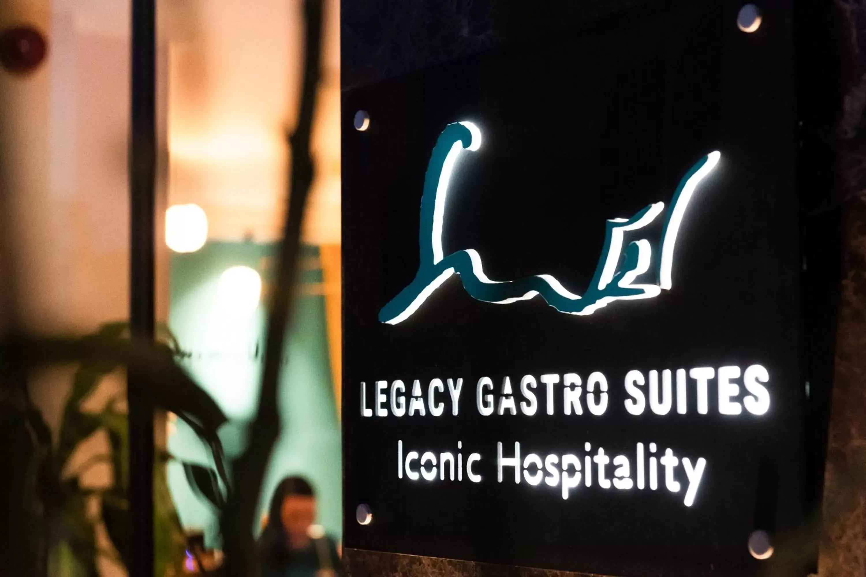 Property logo or sign in Legacy Gastro Suites