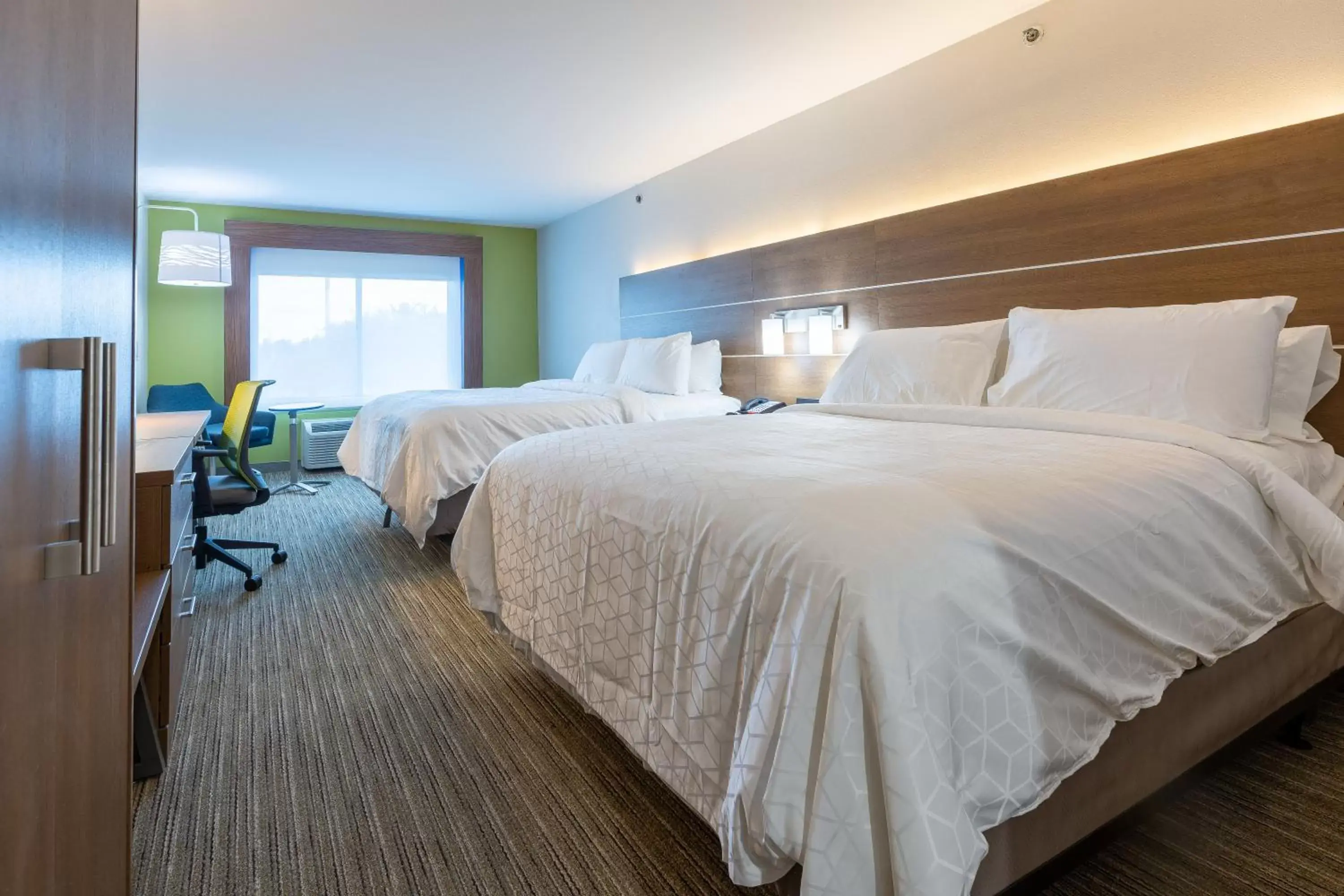 Bed in Holiday Inn Express & Suites Arlington North – Stadium Area, an IHG Hotel