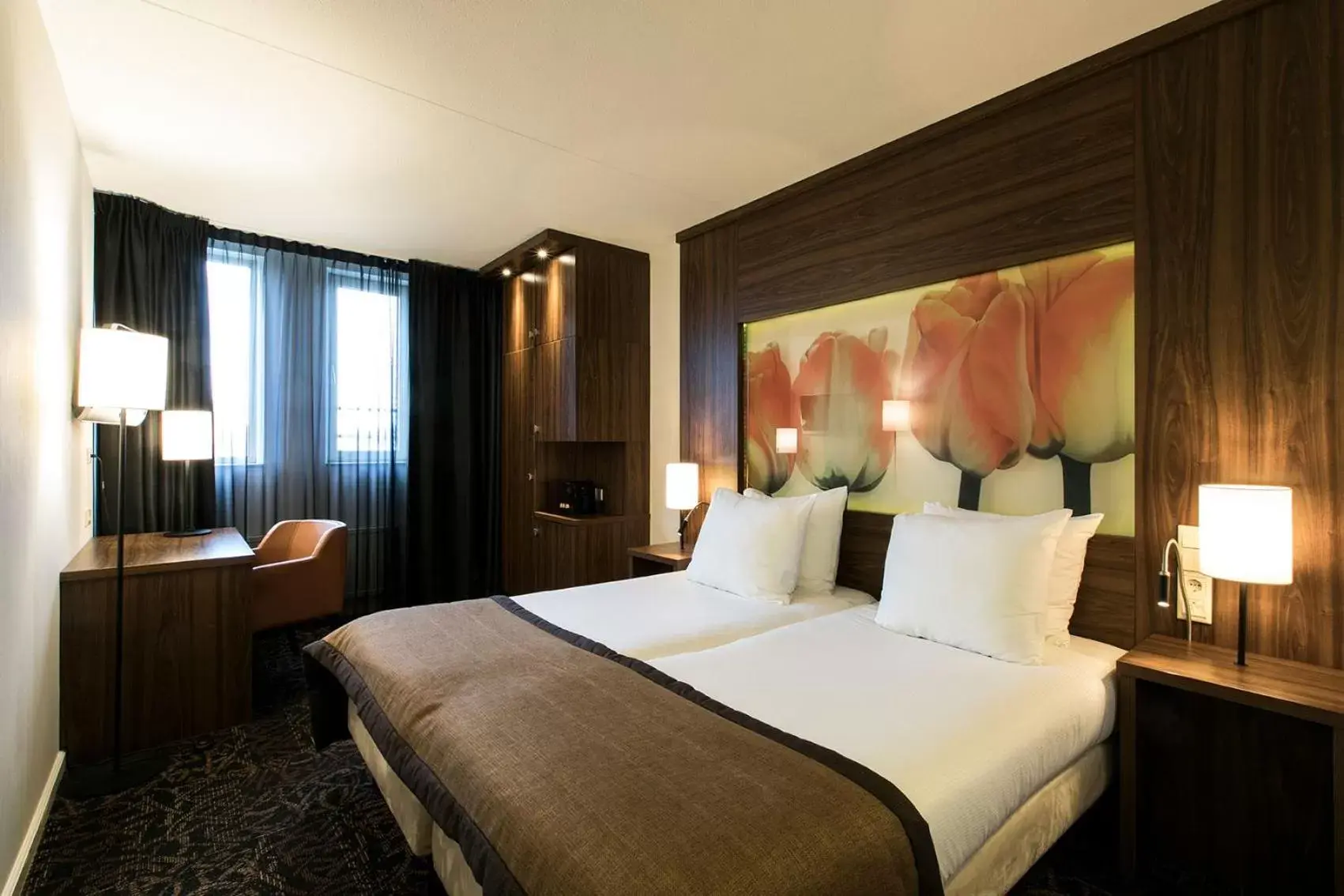 Bed in Eden Hotel Amsterdam