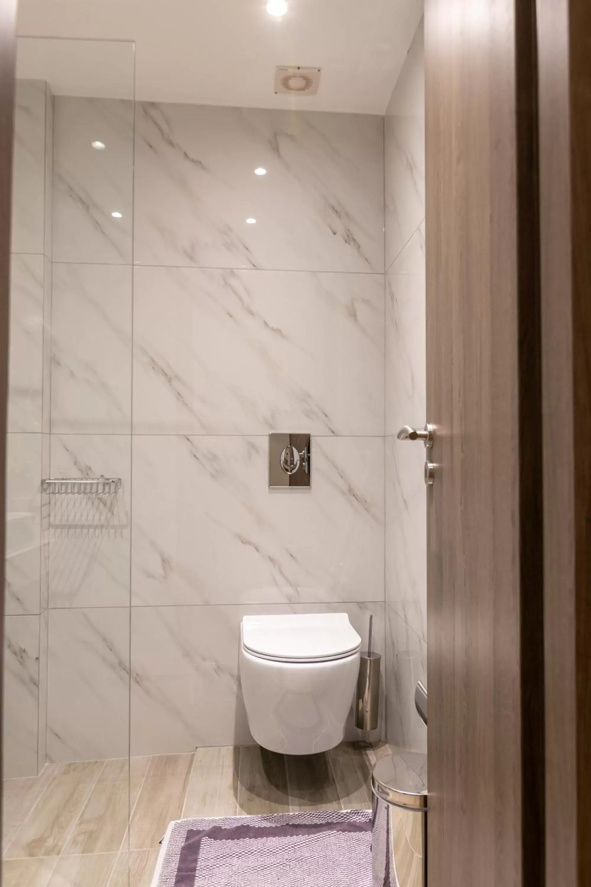 Toilet, Bathroom in New Amaryllis Hotel