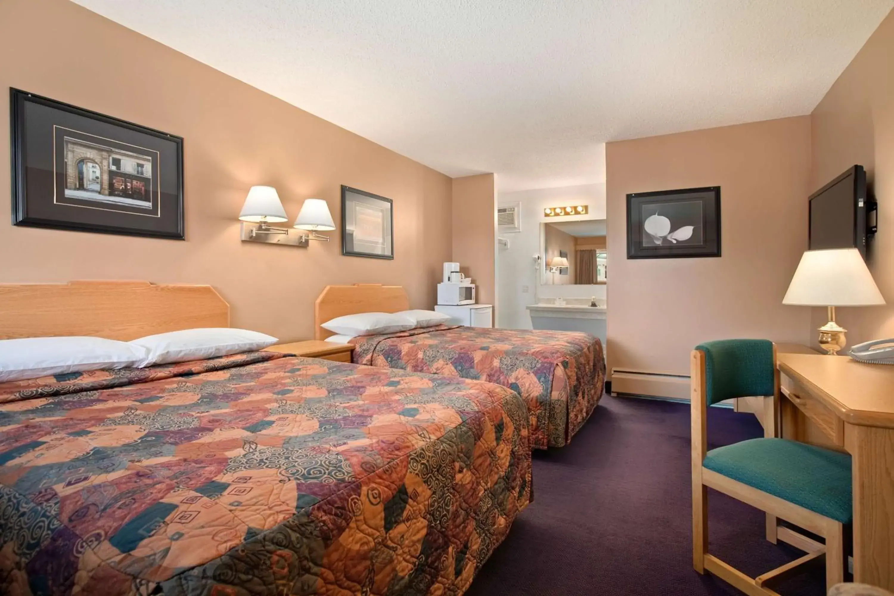 Queen Room with Two Queen Beds - Non-Smoking in Travelodge by Wyndham Moose Jaw
