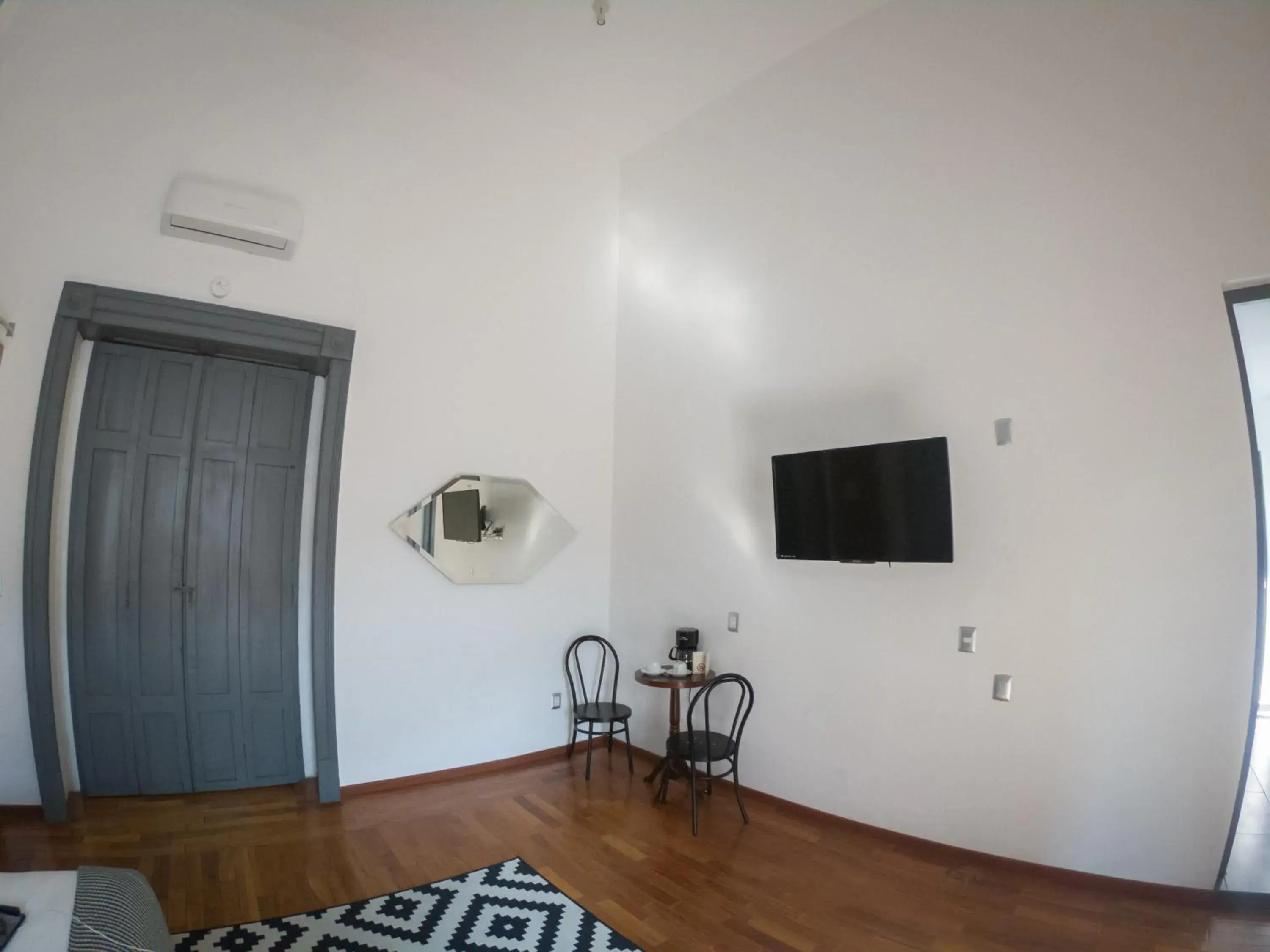 Bedroom, TV/Entertainment Center in Markee Hotel Boutique