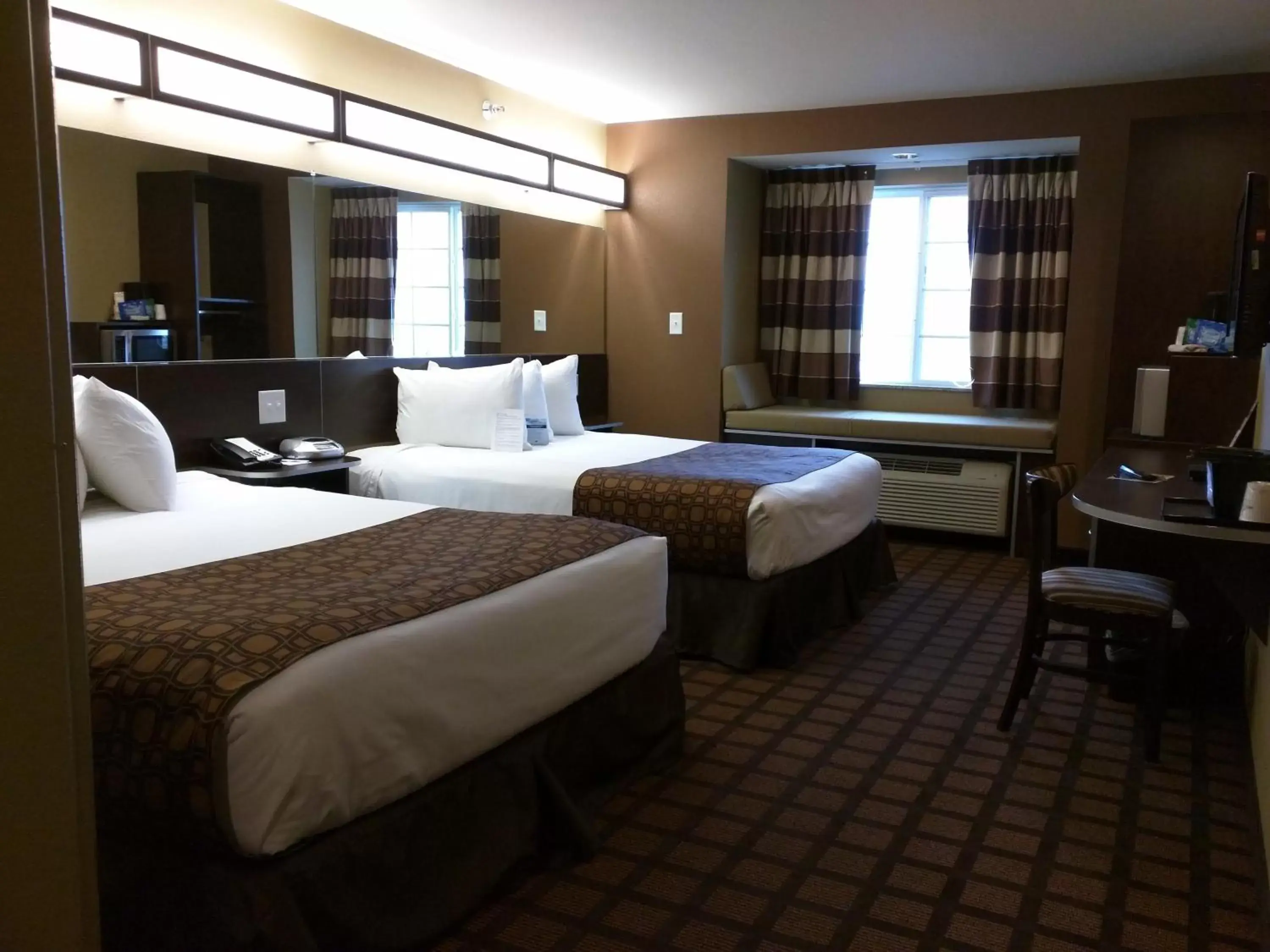 Photo of the whole room, Bed in Microtel Inn & Suites by Wyndham Minot