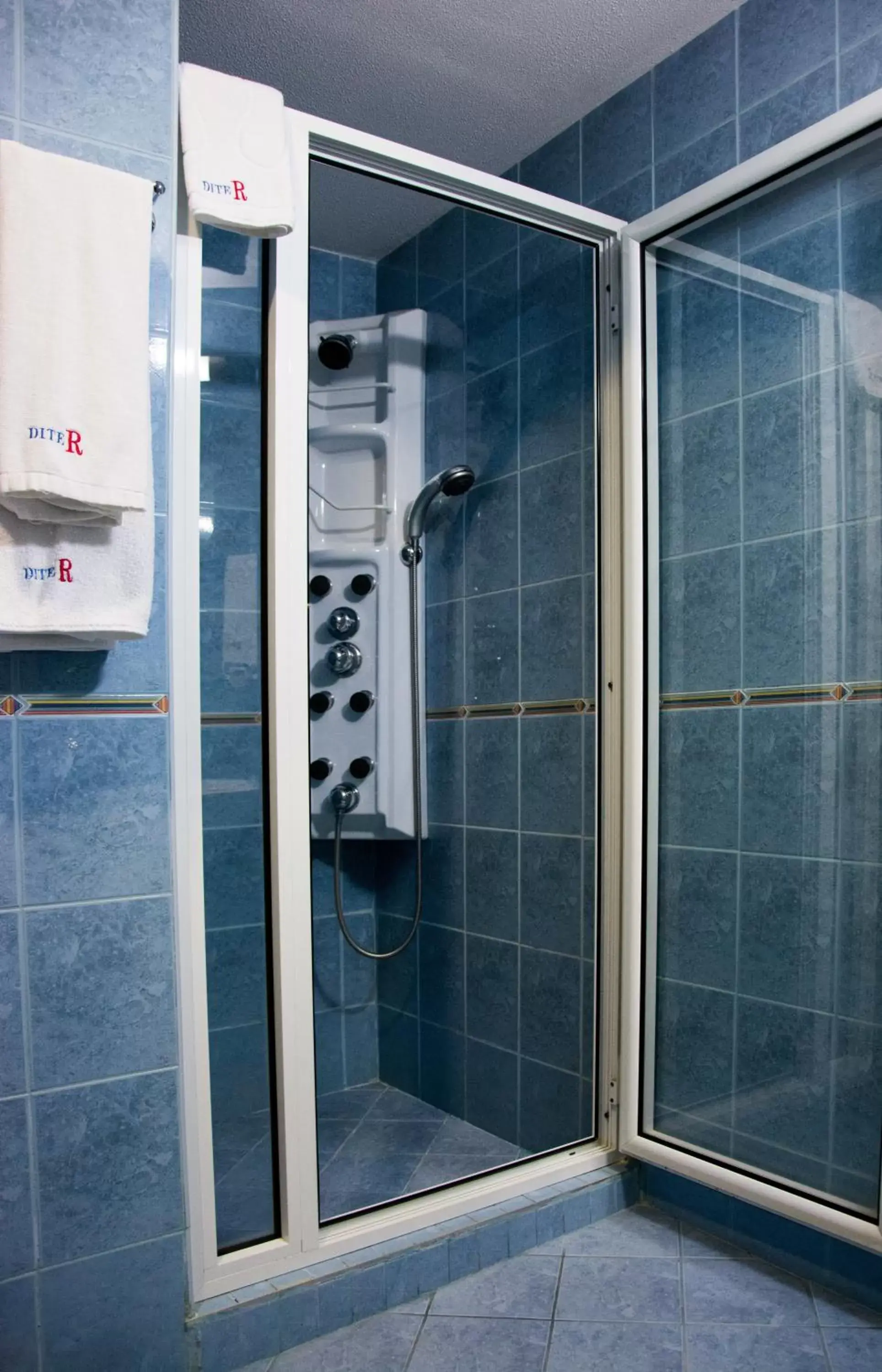 Bathroom in DITER Family Hotel