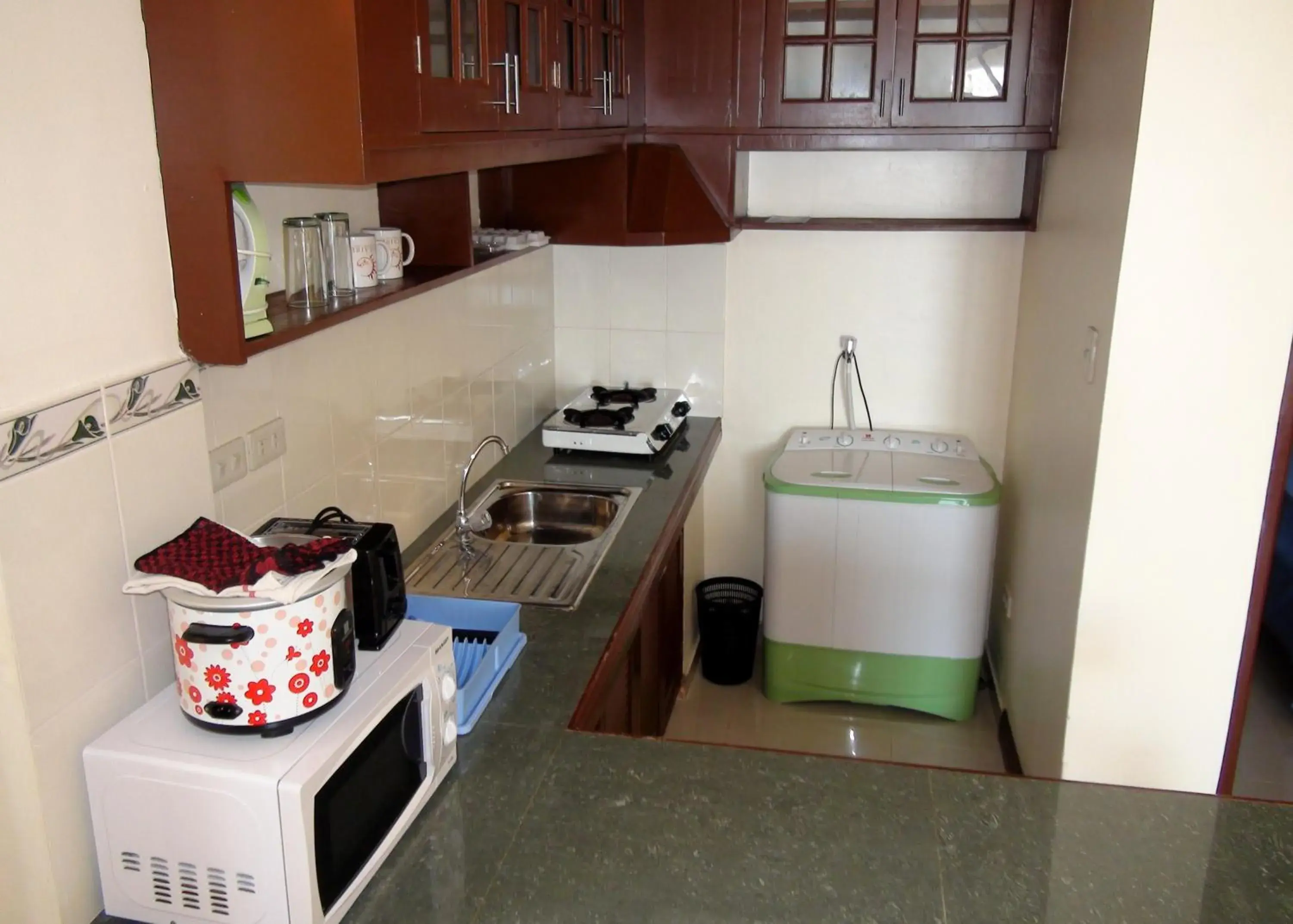 Kitchen or kitchenette in Squares Beachside Apartments Kitchen or kitchenette in Squares Beachside Apartments