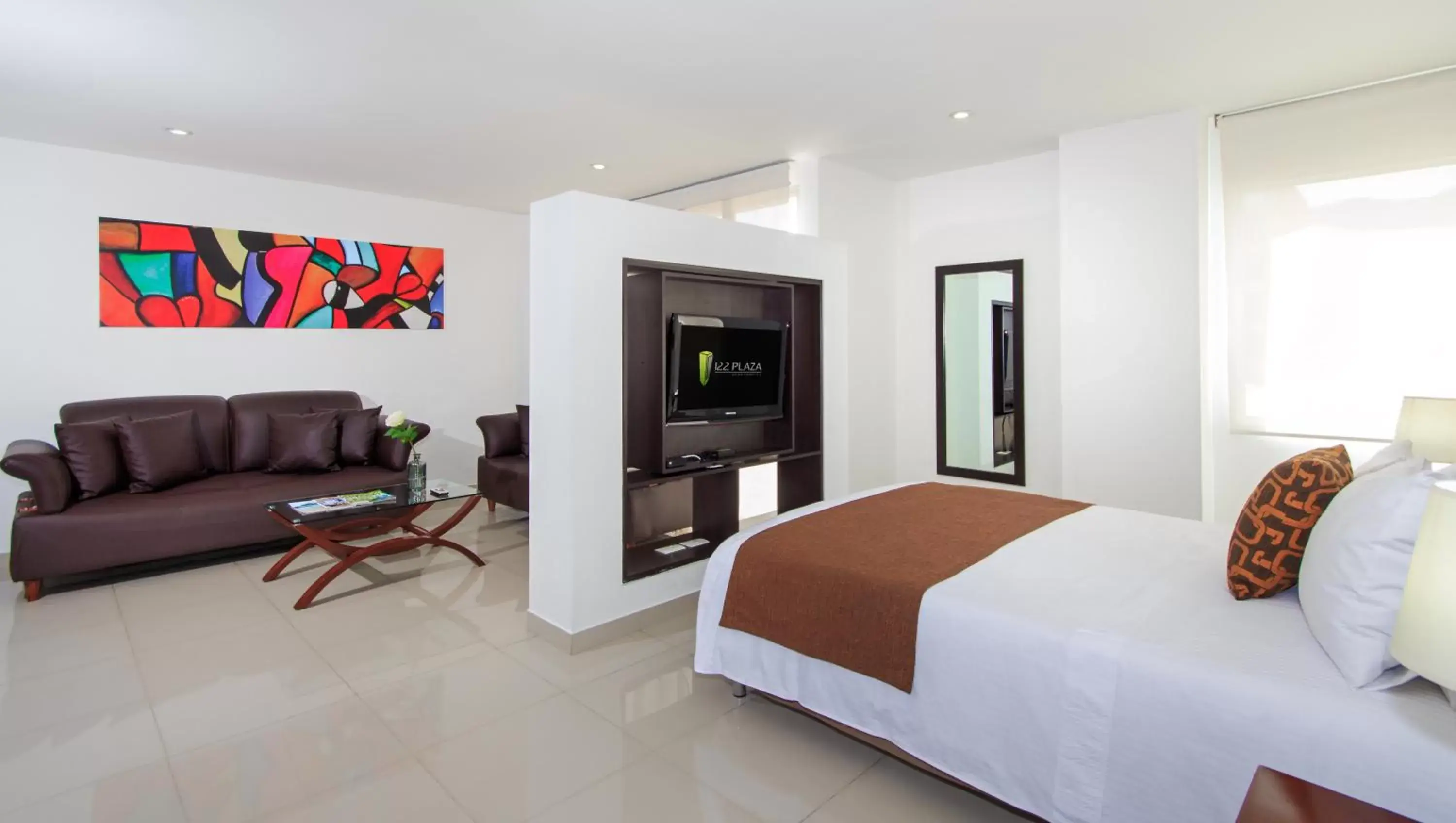 Living room, Bed in 122 Plaza Apartahotel Living room, Bed in 122 Plaza Apartahotel