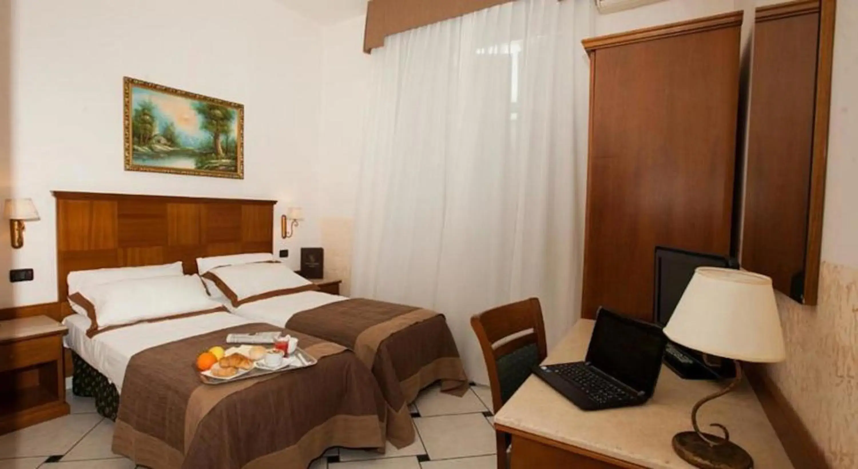 Bed, Room Photo in Hotel Garibaldi