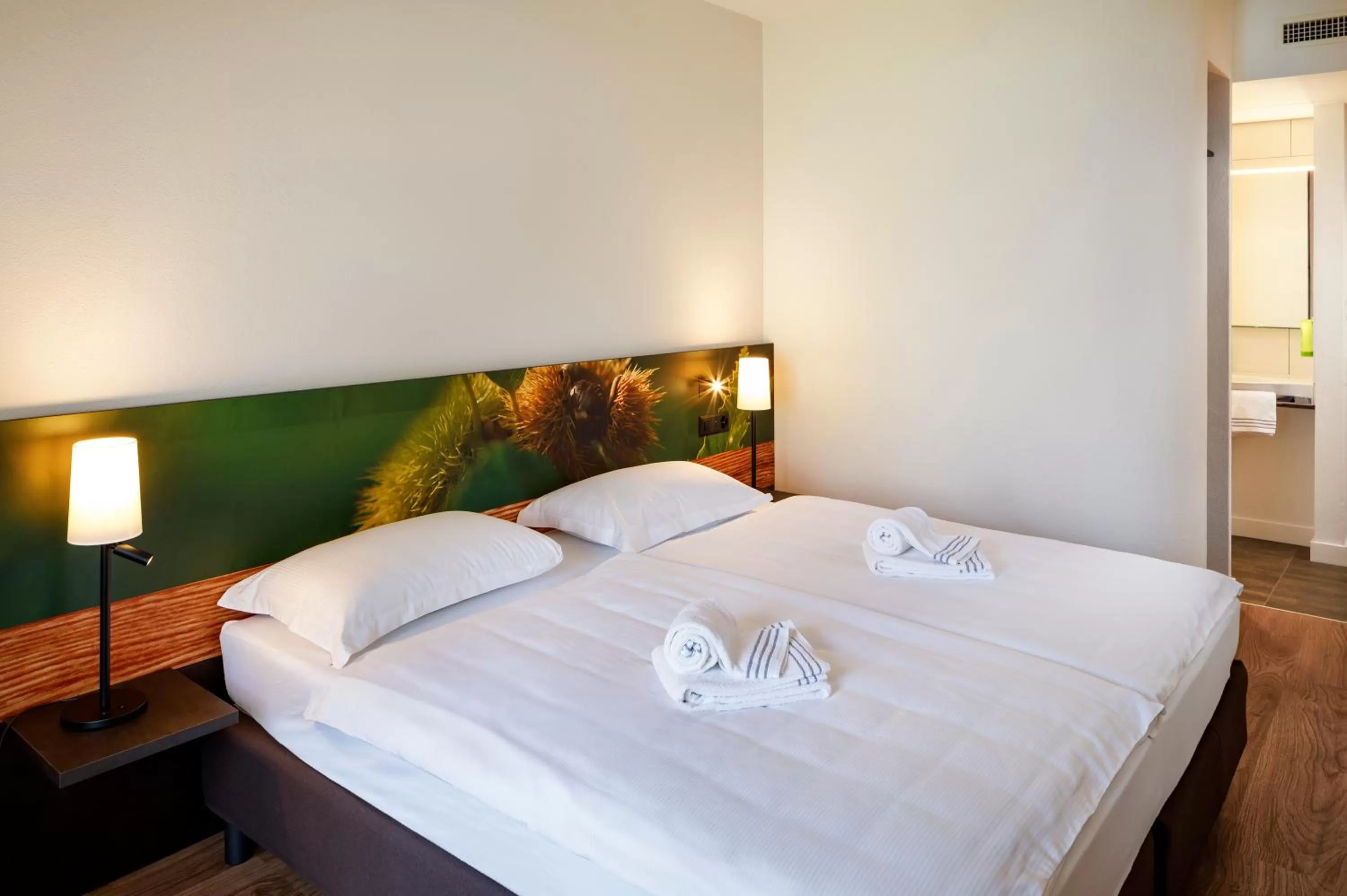 Bedroom, Bed in Hotel Bellinzona Sud Swiss Quality