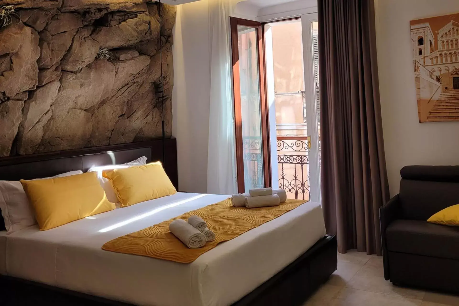 Bed in Palazzo Ferrucci Luxury Suites
