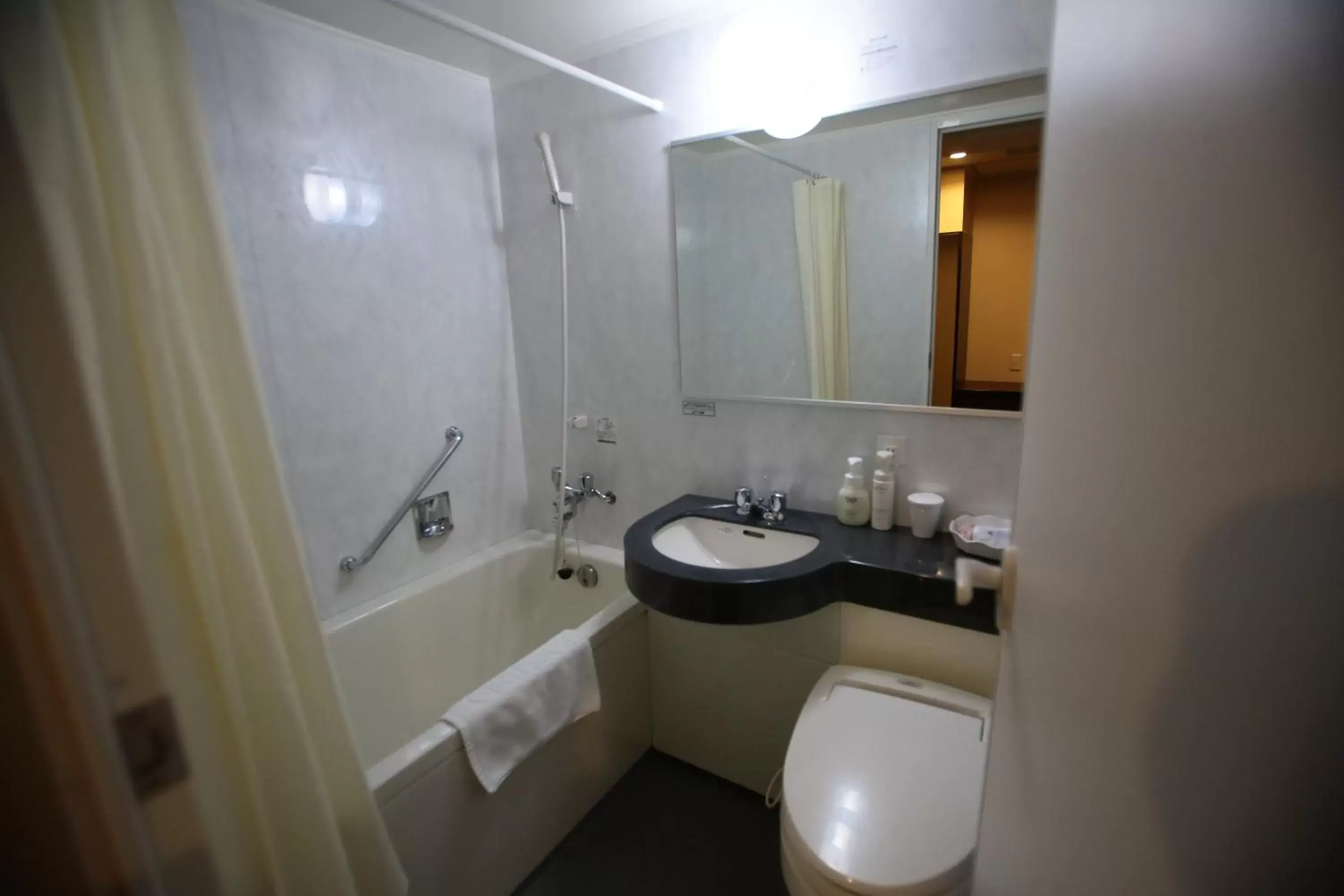 Photo of the whole room, Bathroom in International Hotel Ube