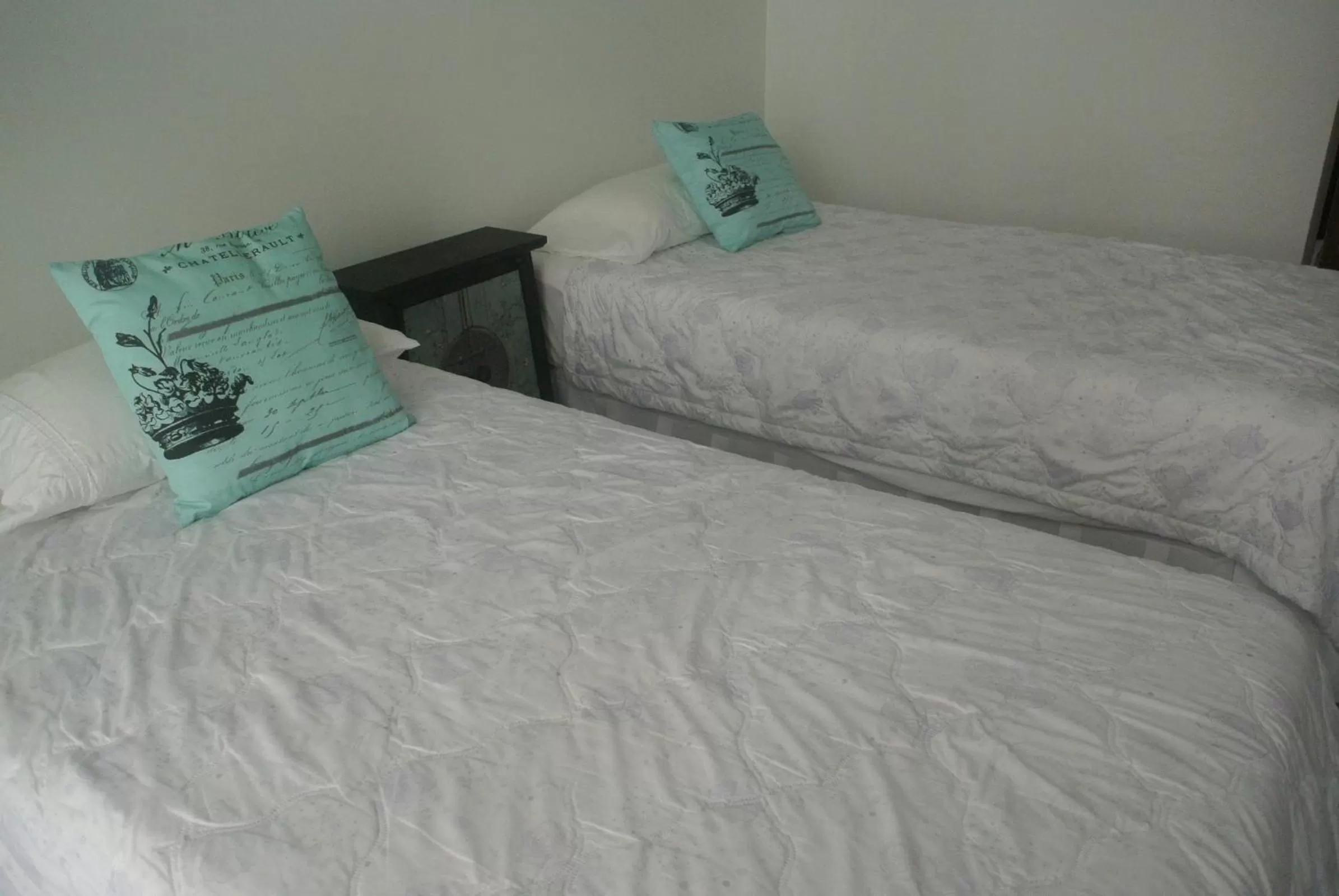 Bed in Oriental Smile Hotel