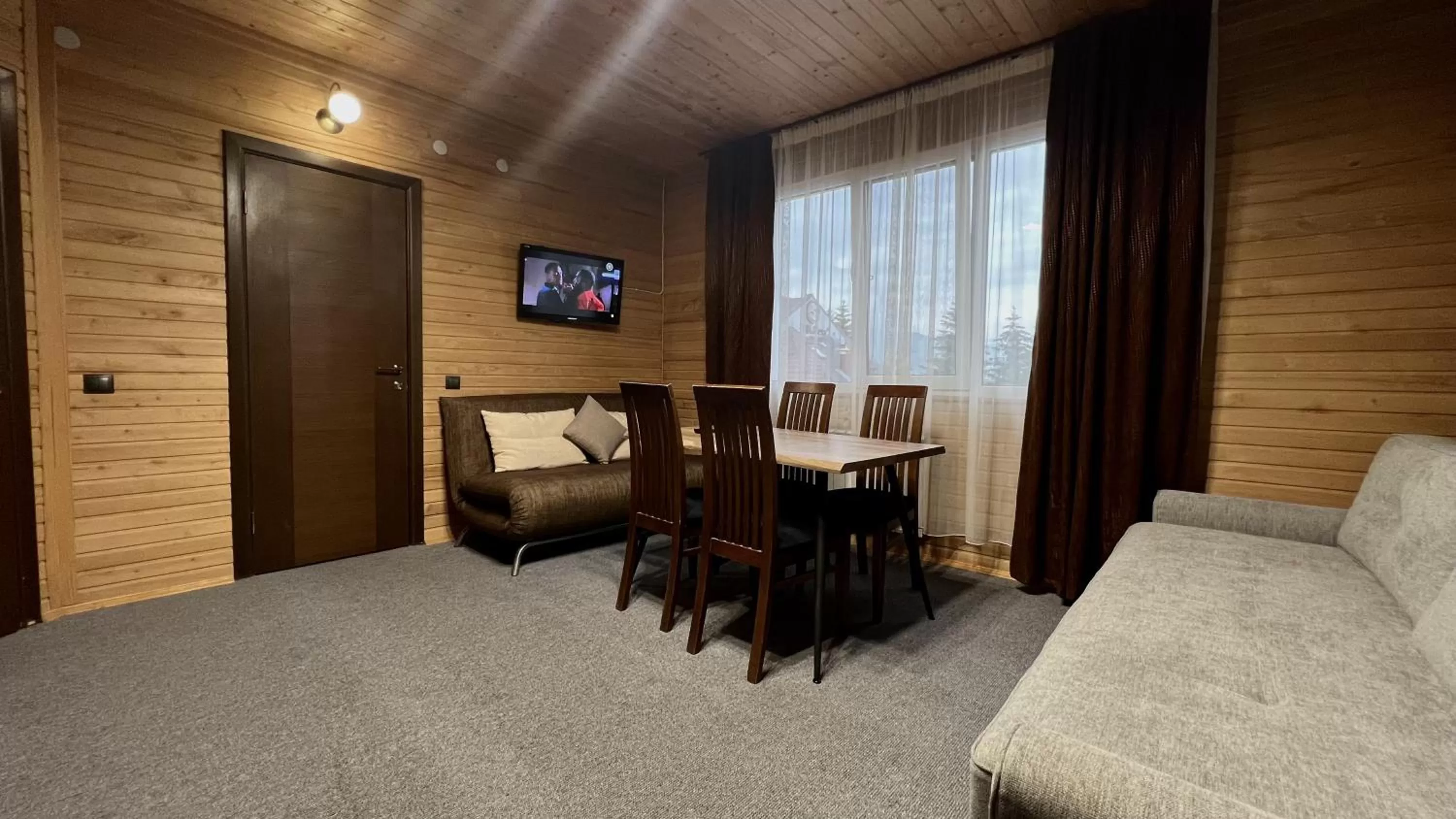 Living room, Dining Area in Wellland Hotel