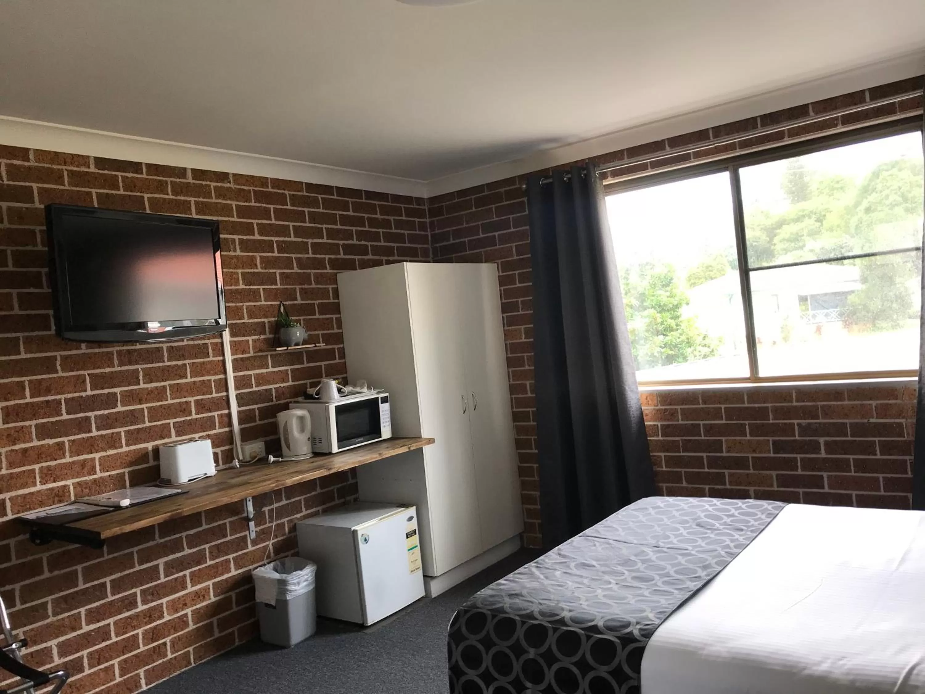 Bed in Coffs Shearwater Motel