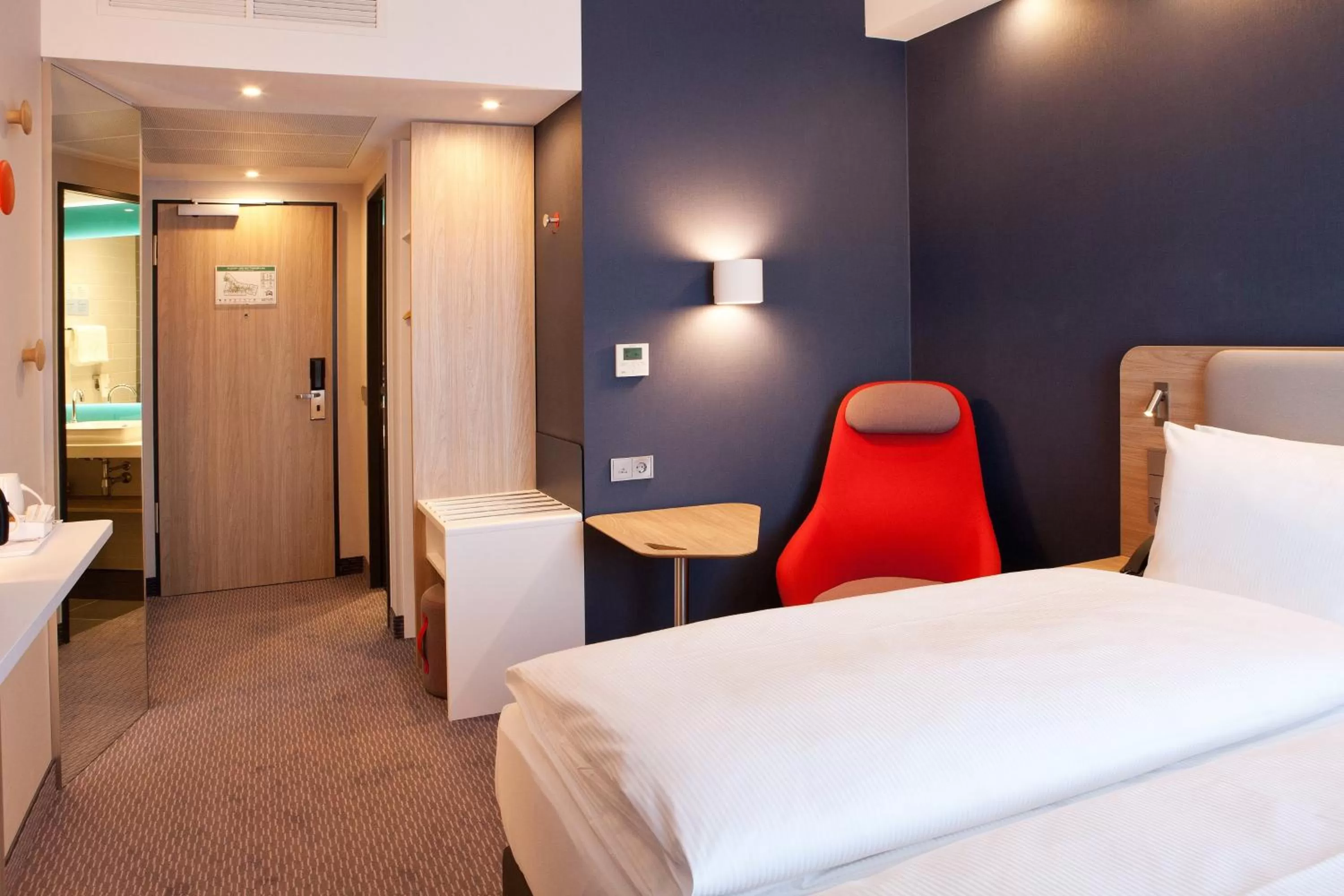 Photo of the whole room, Bed in Holiday Inn Express Munich - Olympiapark by IHG