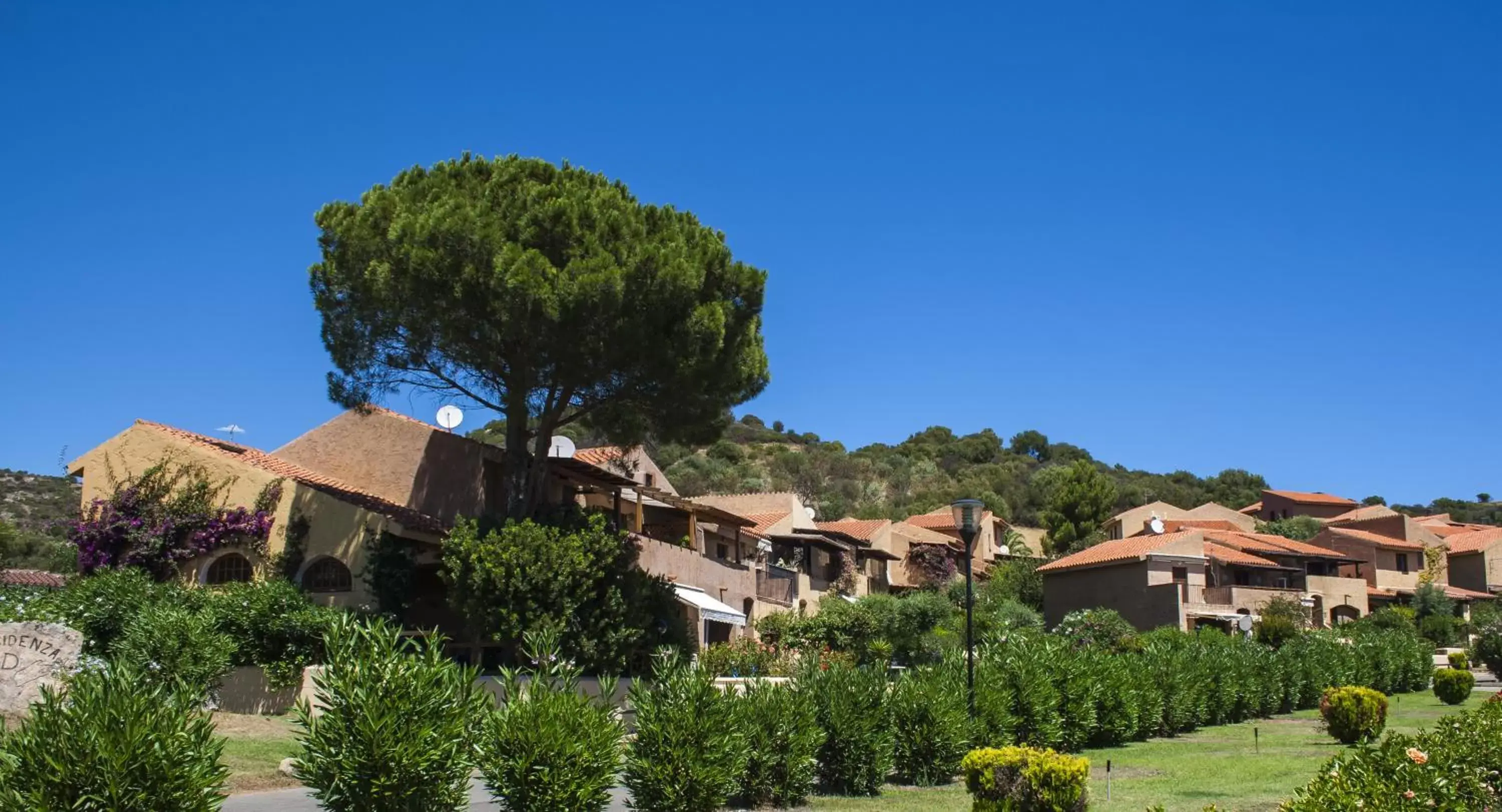 Facade/entrance, Neighborhood in Porto Ottiolu Resort