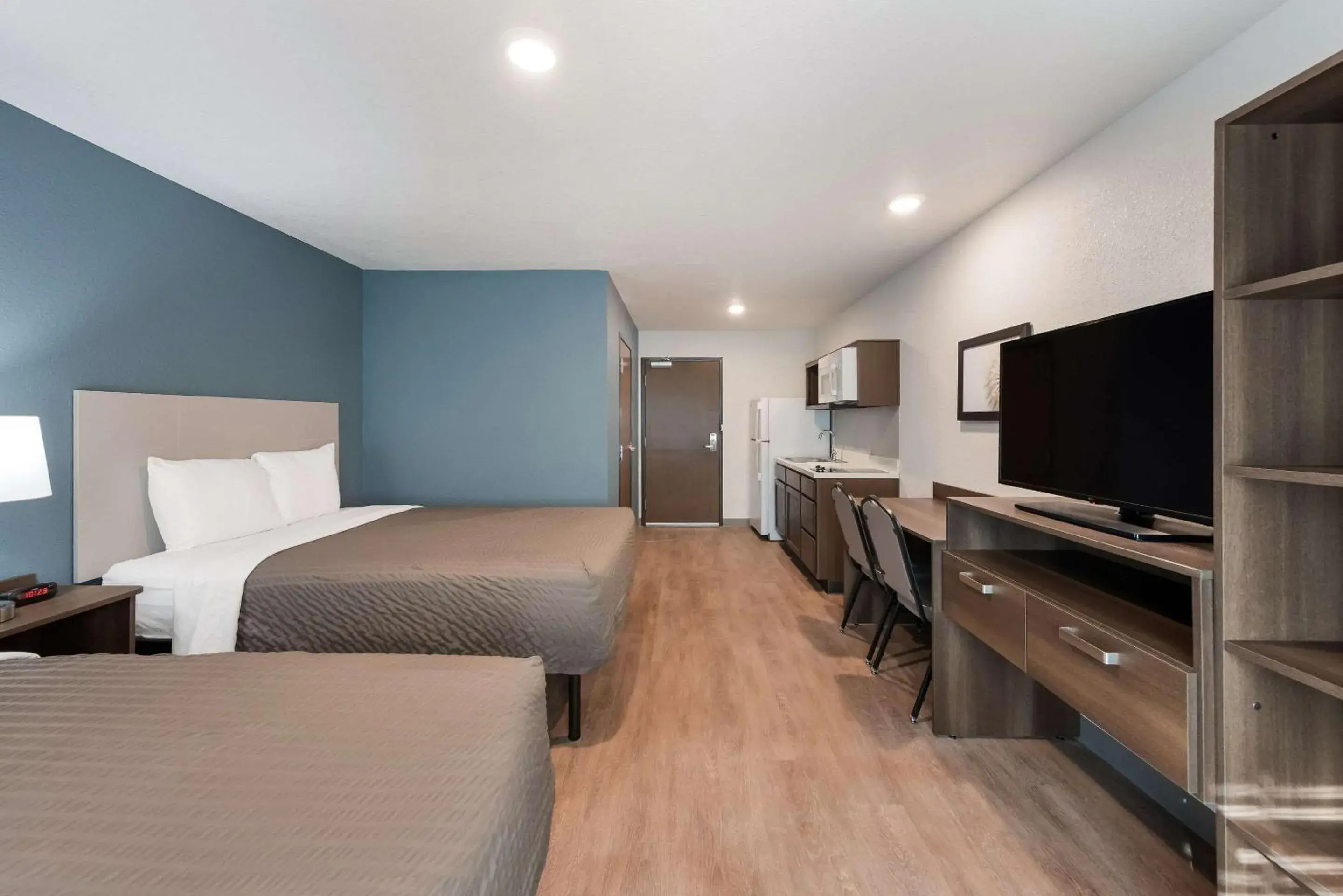 Bedroom, Bed in WoodSpring Suites Dayton North