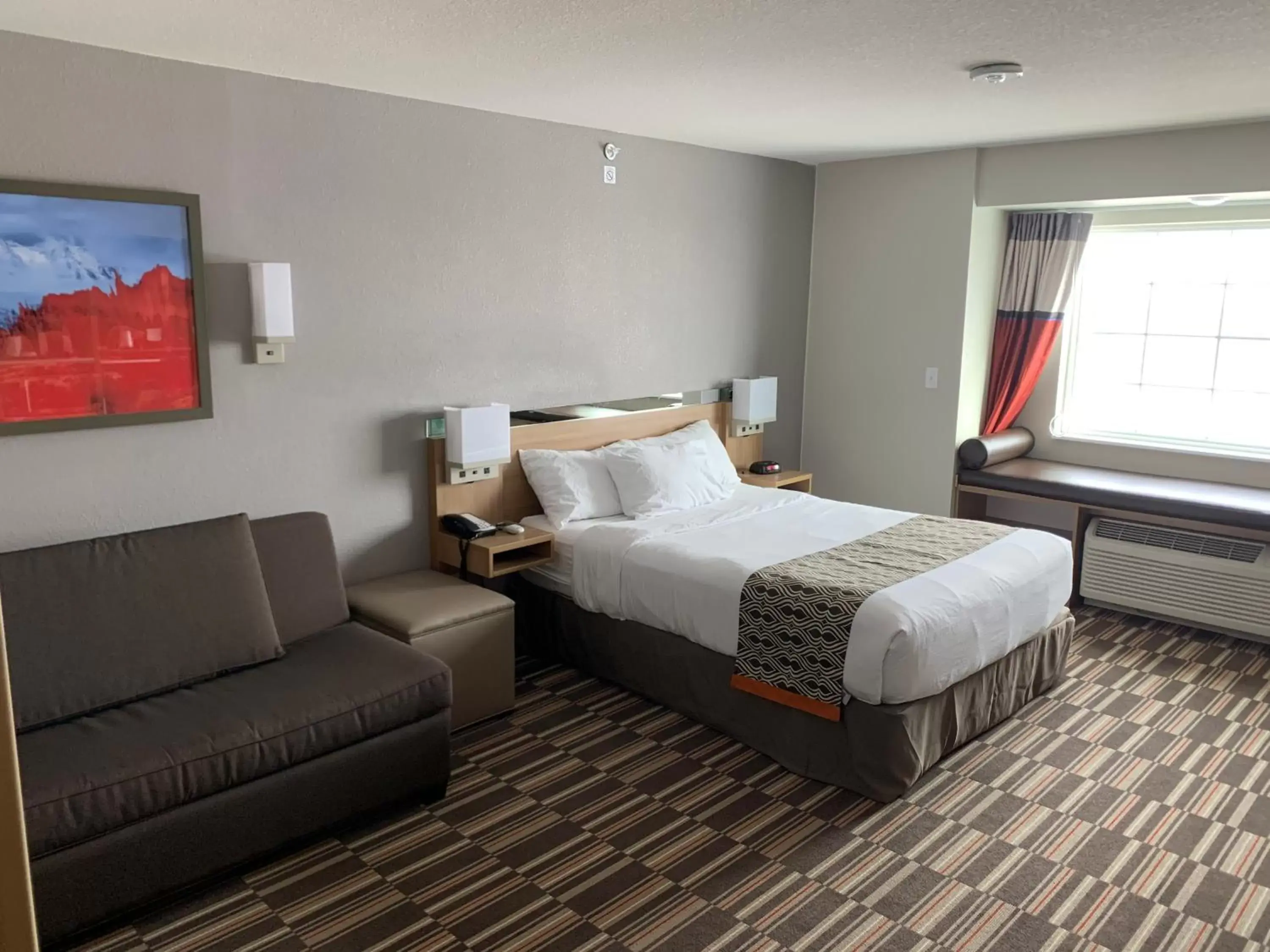 Bed in Microtel Inn & Suites by Wyndham Limon