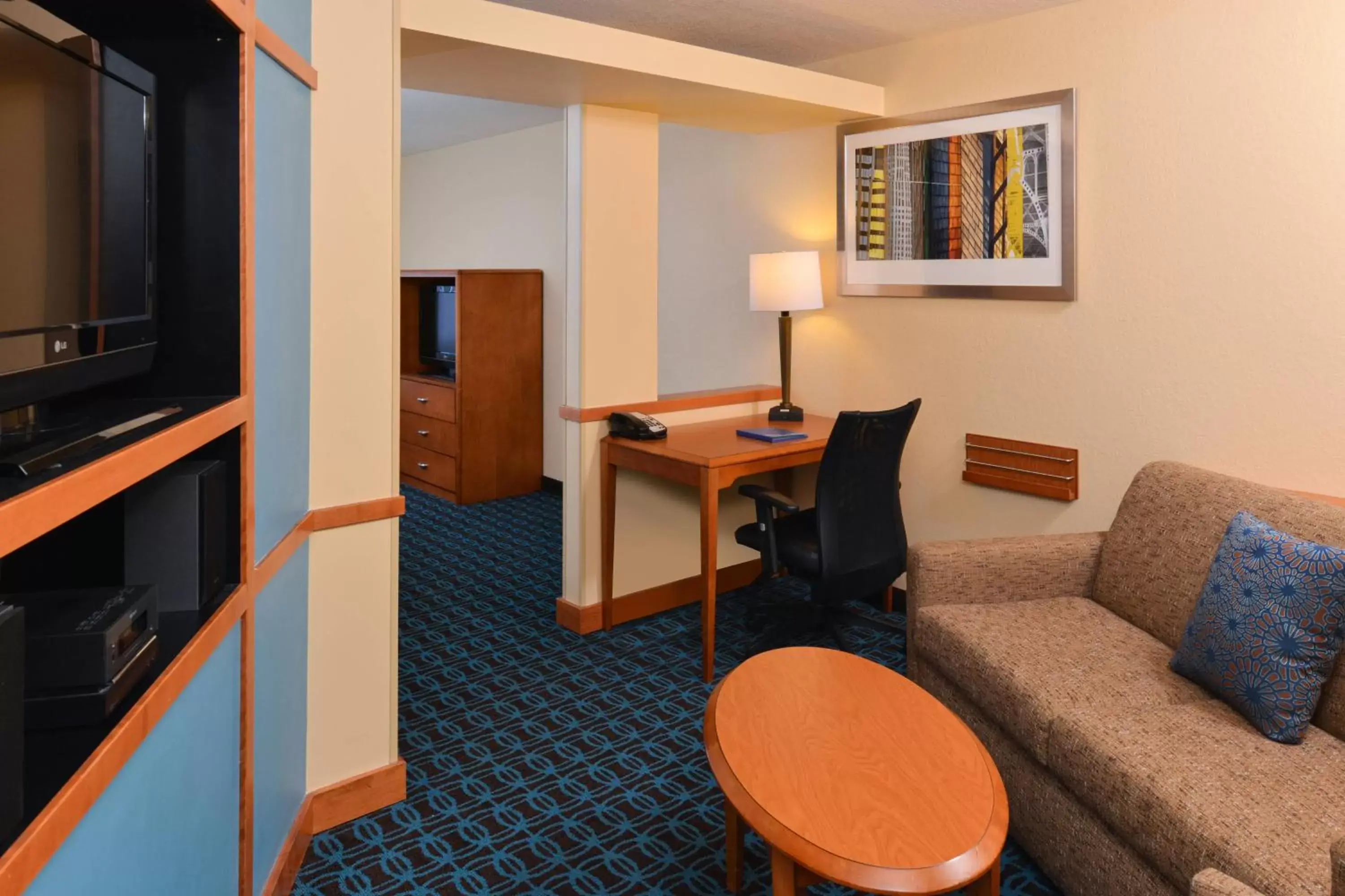 Photo of the whole room, TV/Entertainment Center in Fairfield Inn & Suites Bloomington