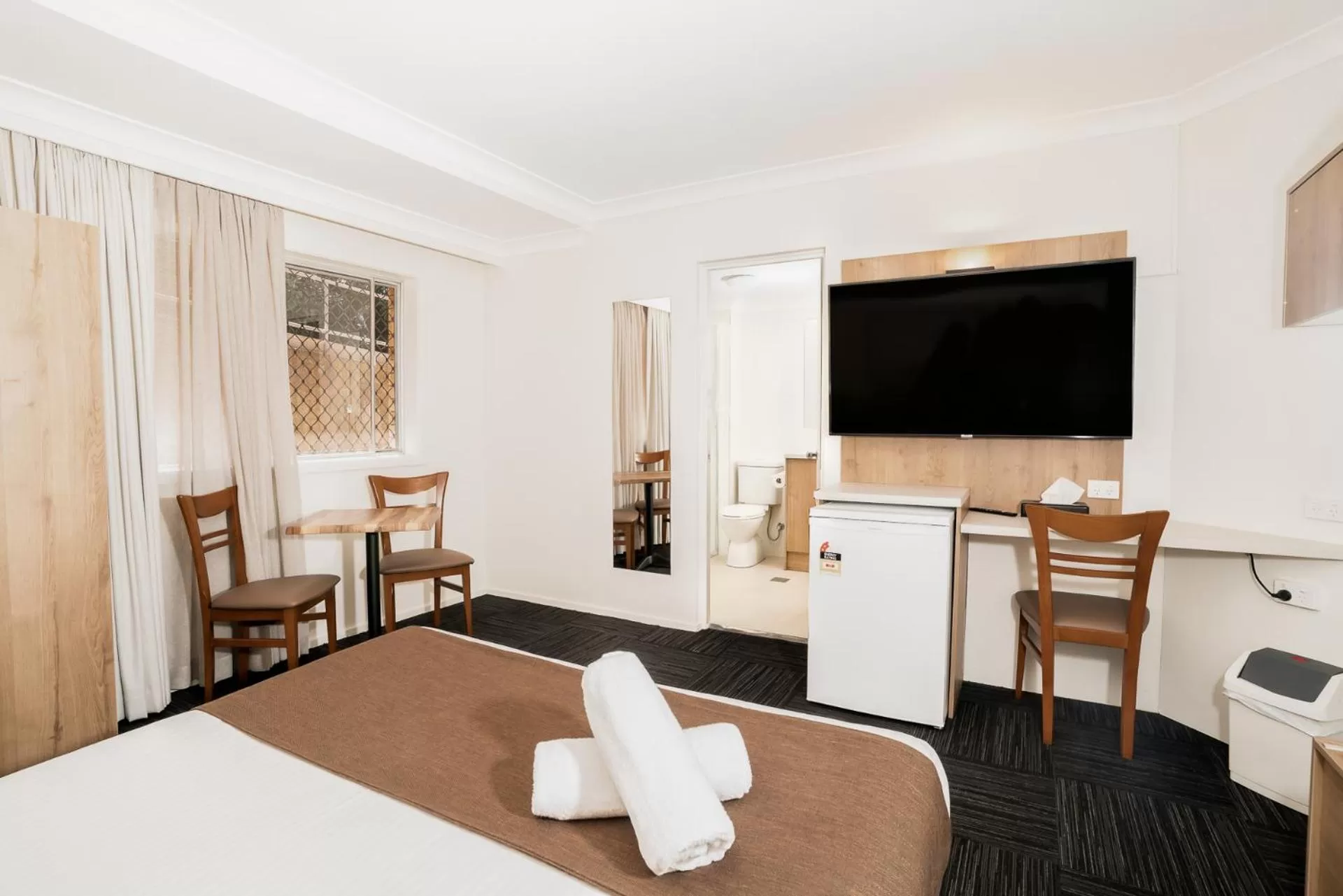 Bed in Caribbean Motel