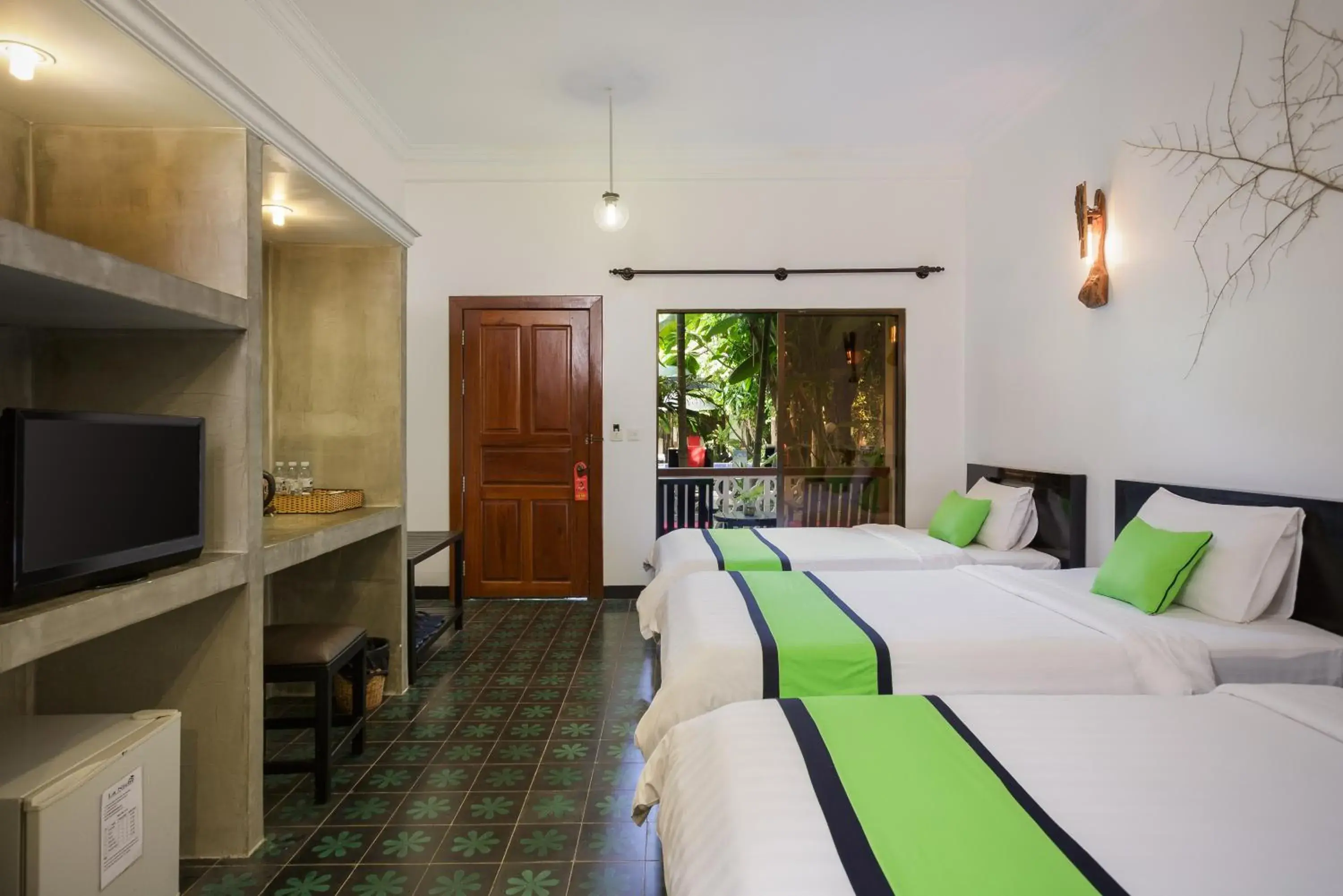 Bed in La Residence Watbo Hotel