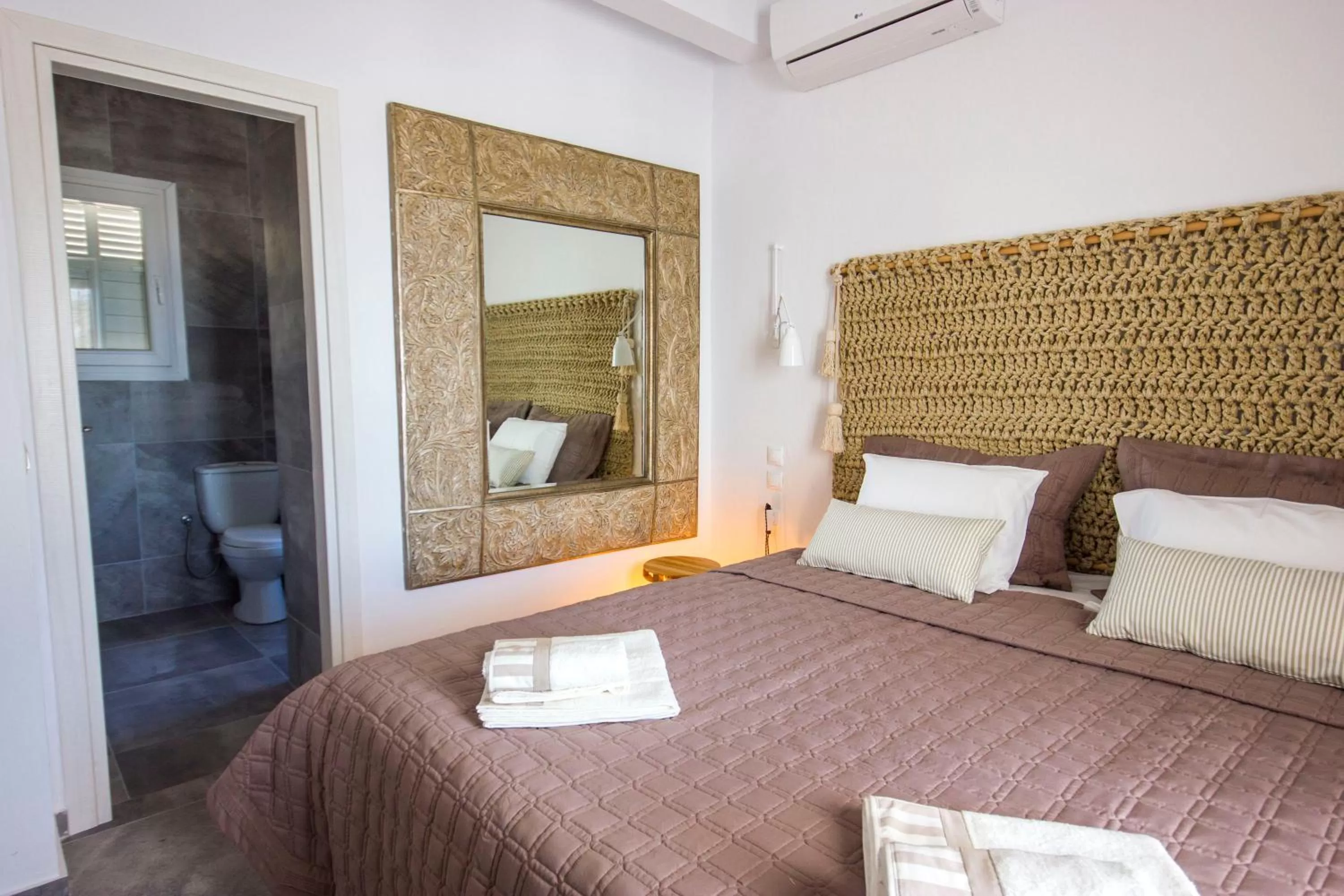 Bed in Amperian Mykonos Suites & Villas