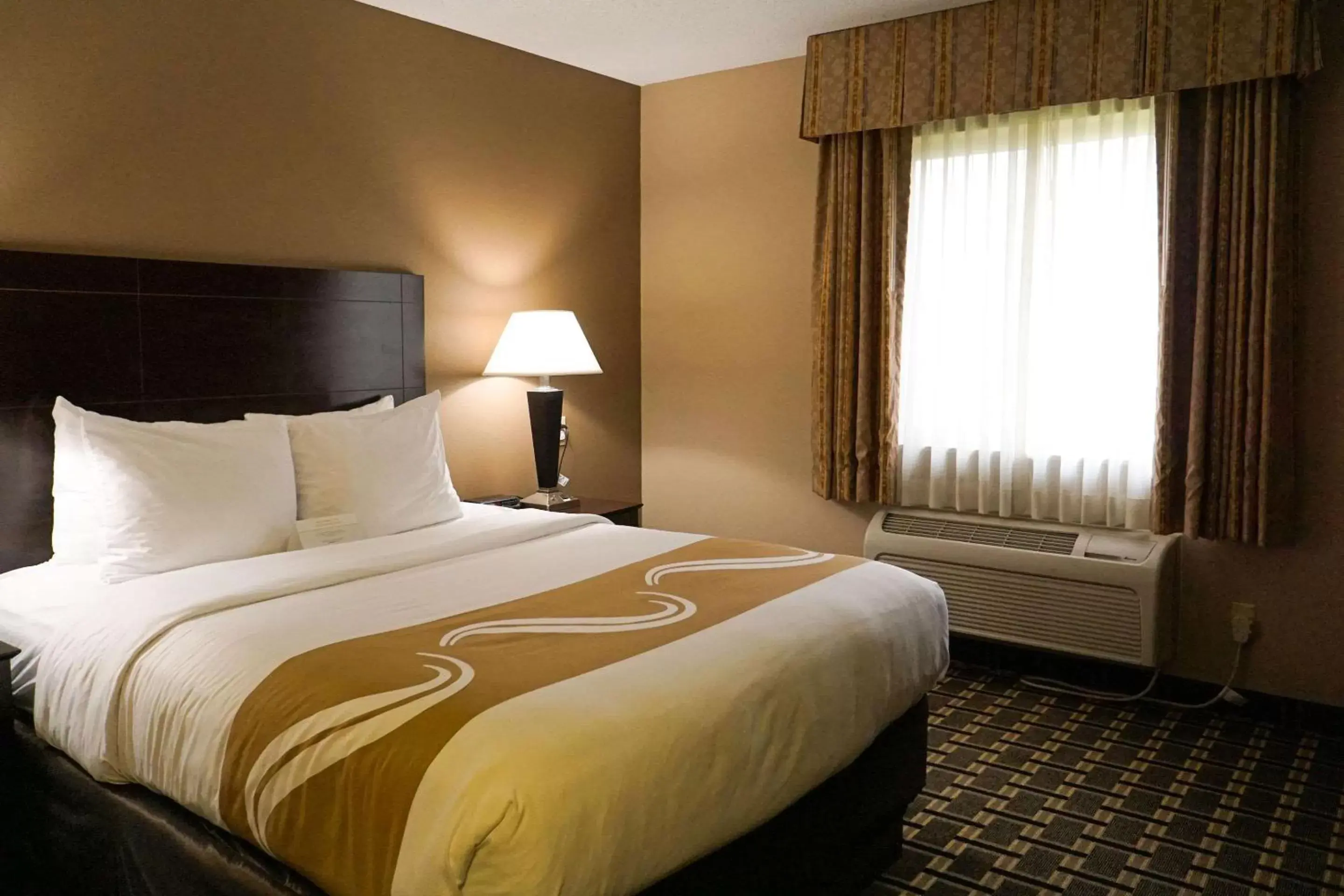 Photo of the whole room, Bed in Quality Inn & Suites Watertown
