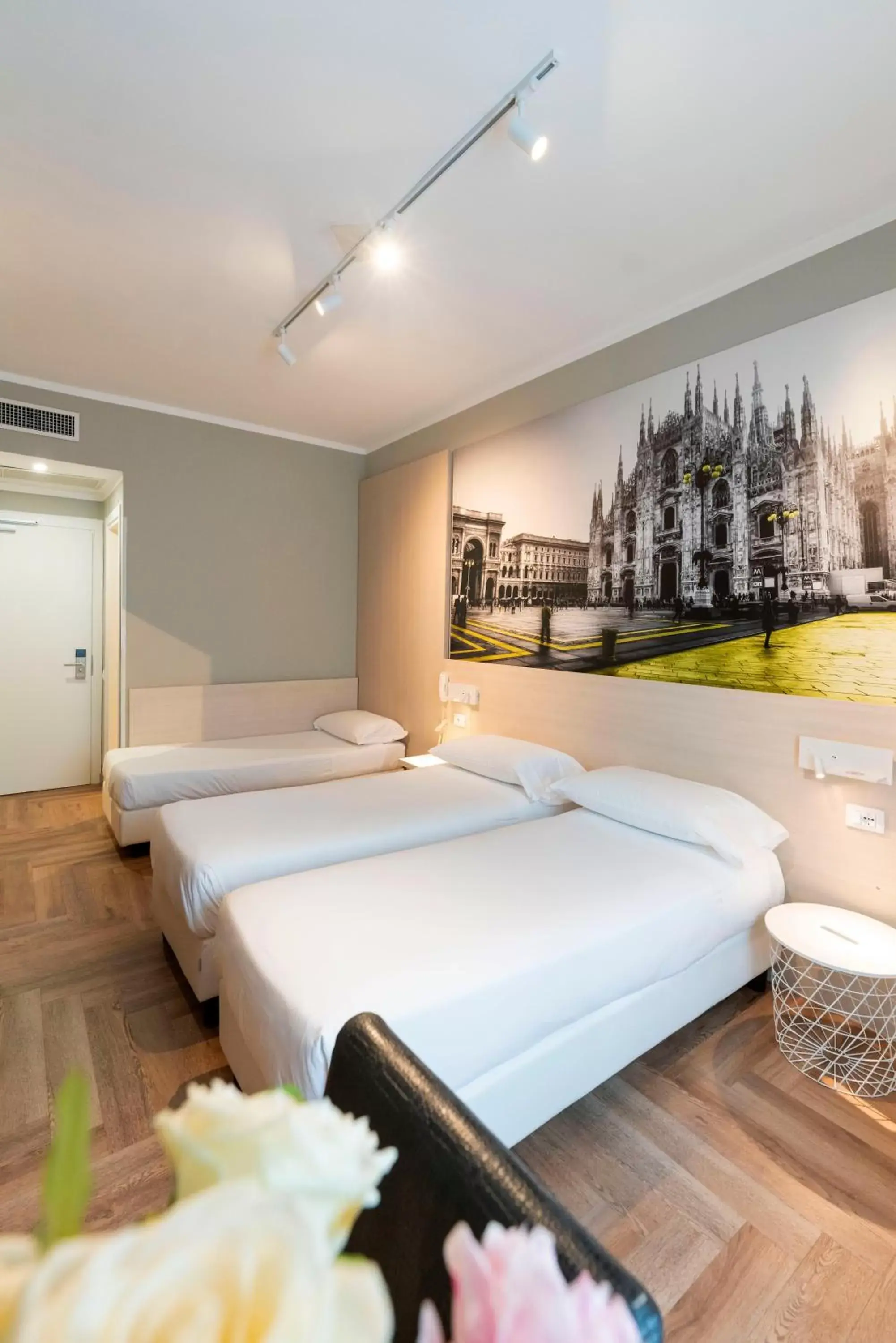 Bed in Kleos Hotel Milano