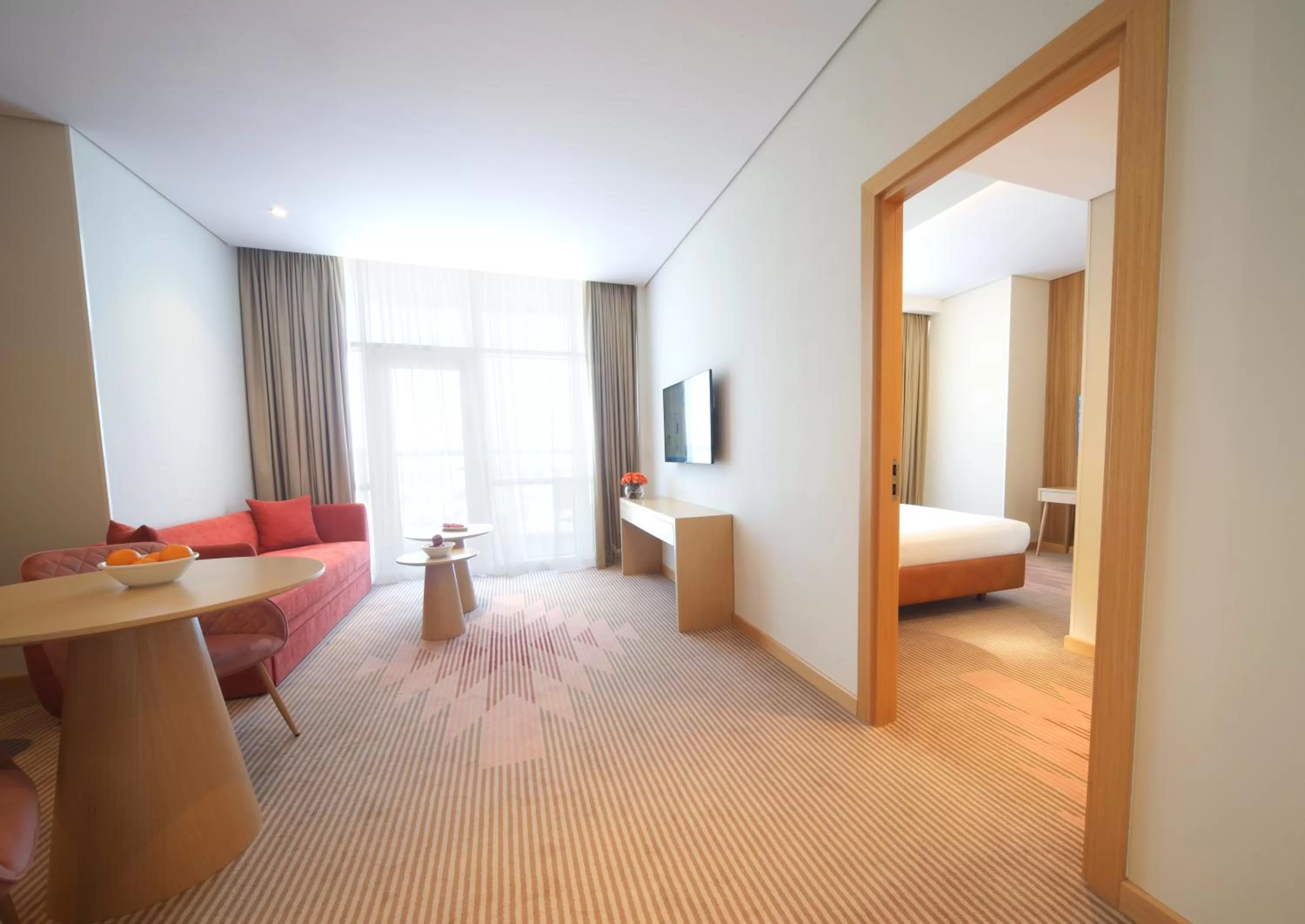 Living room, Bed in Novotel Jumeirah Village Triangle