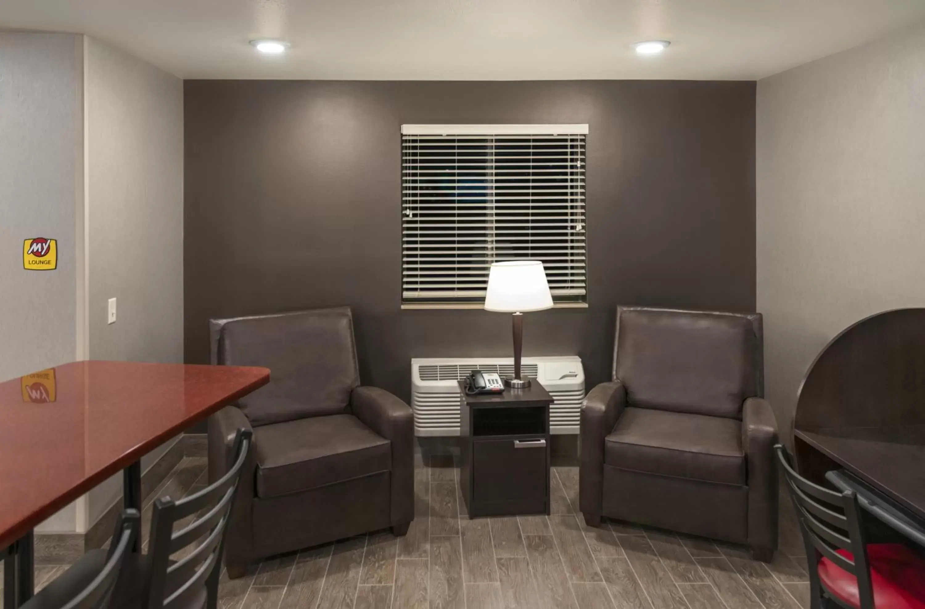 Communal lounge/ TV room, Seating Area in My Place Hotel-Jacksonville-Camp Lejune, NC