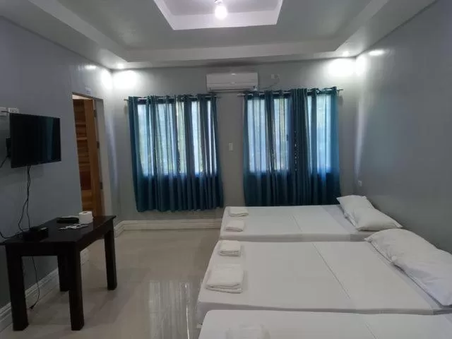 Bed in Sandscape Hotel