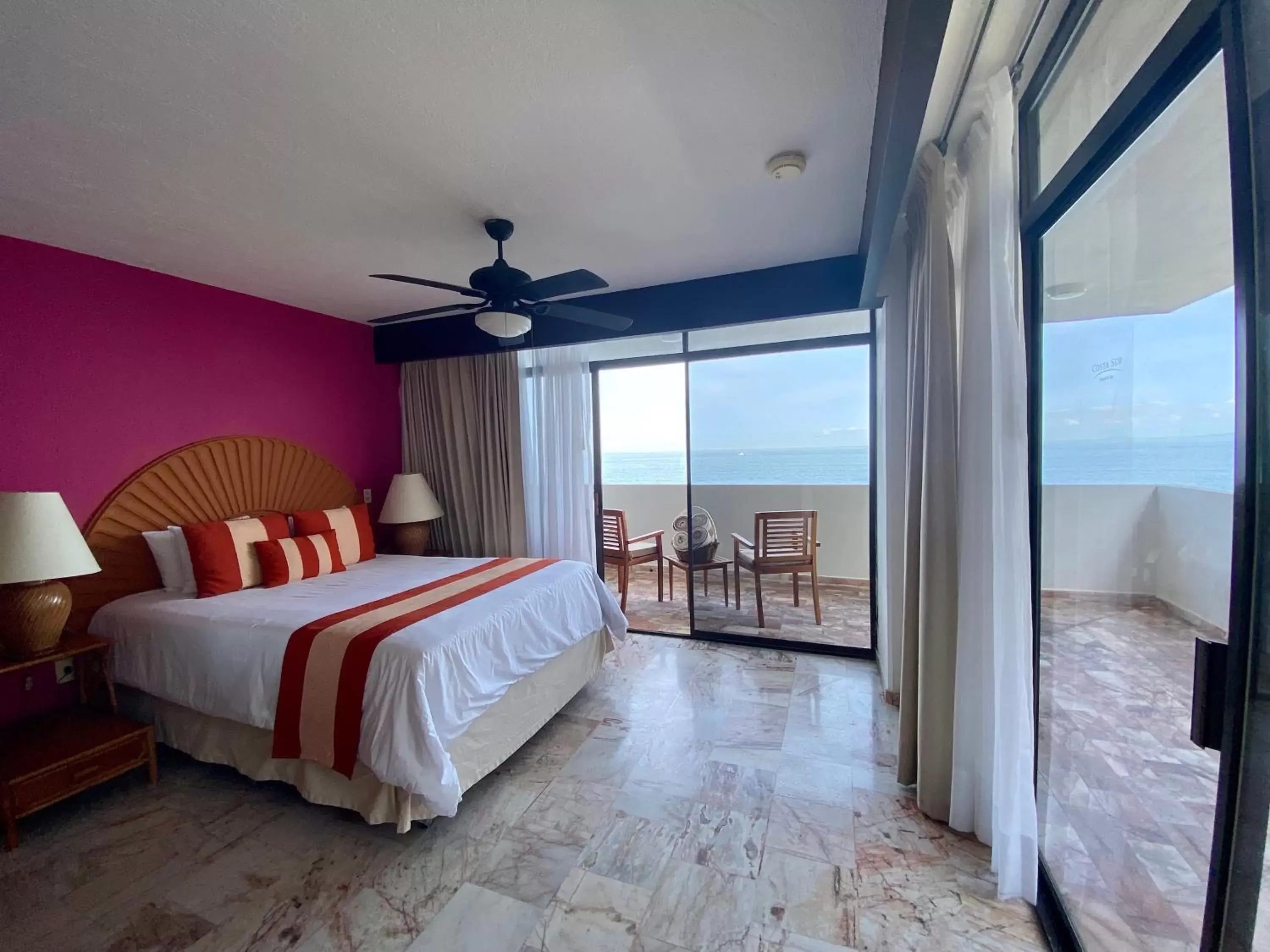 Bed in Costa Sur Resort & Spa
