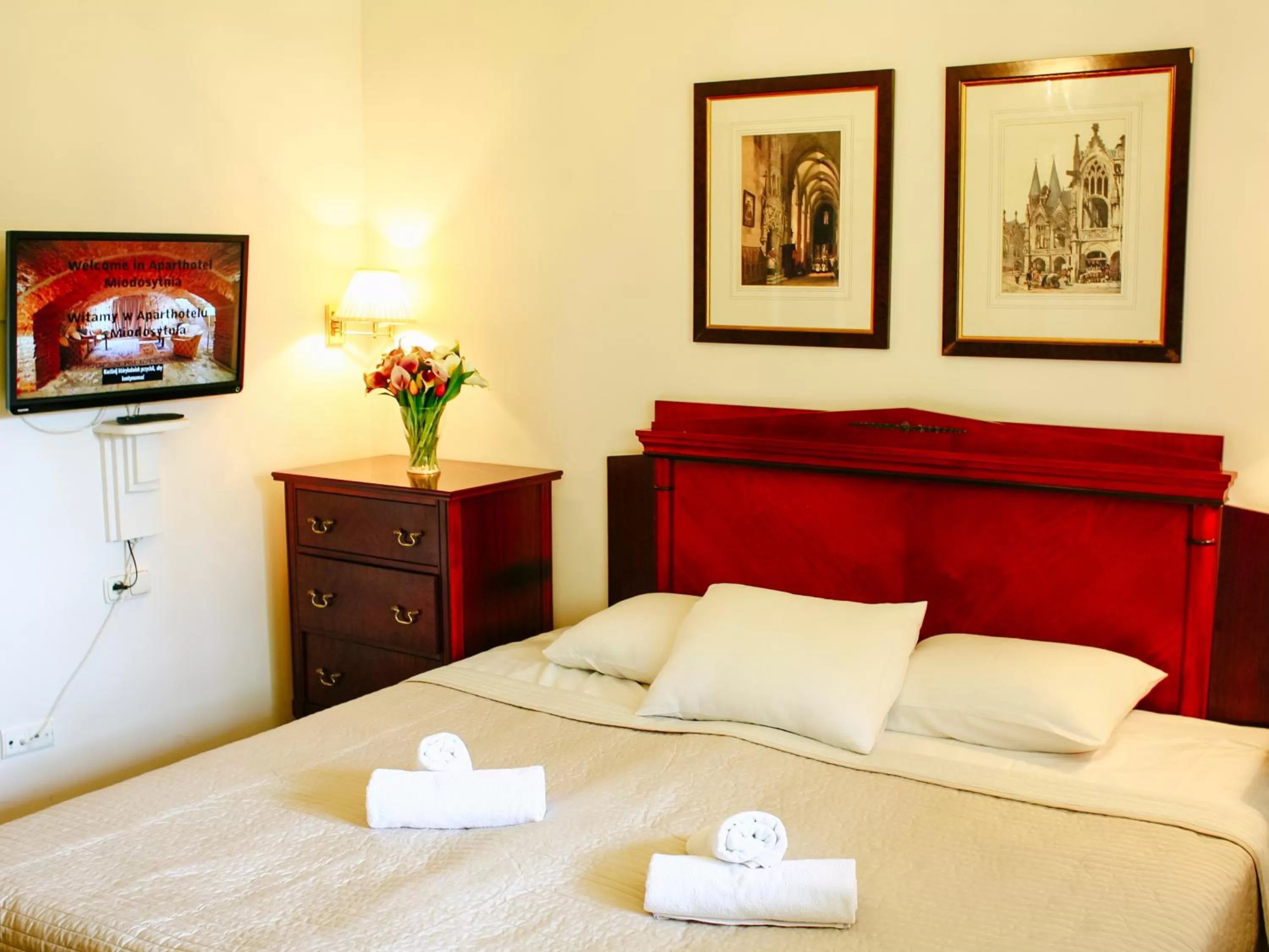 Bed in Miodosytnia Aparthotel