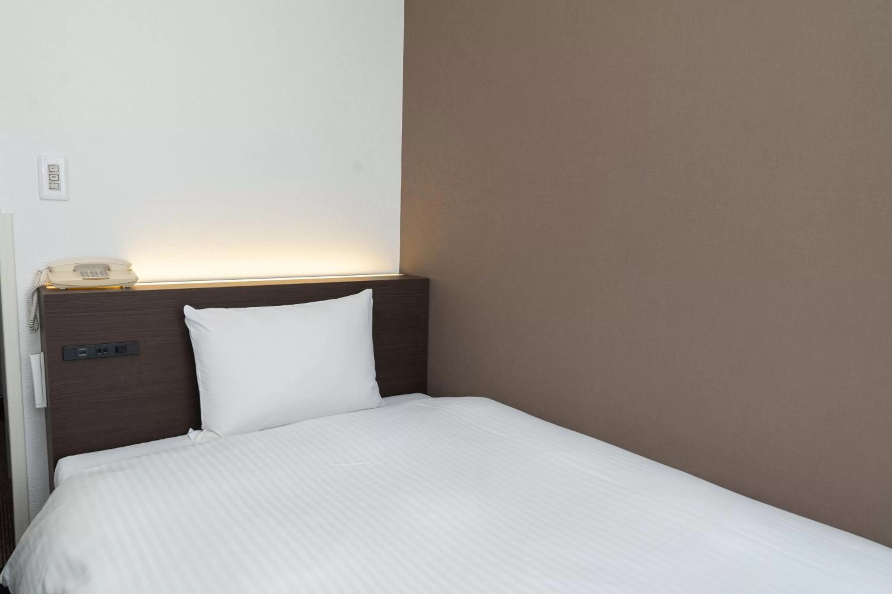 Photo of the whole room, Bed in Heiwadai Hotel Tenjin