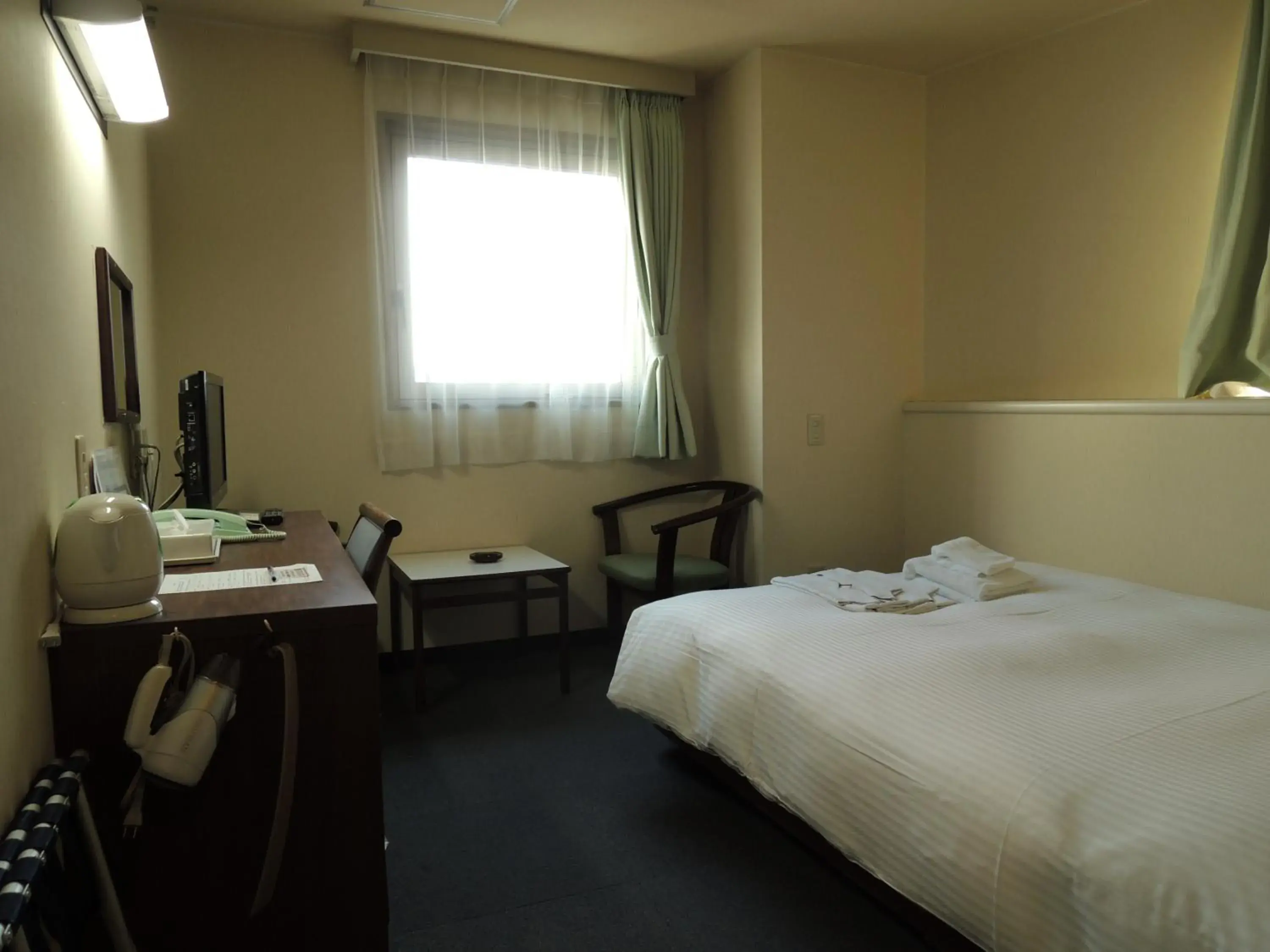 Photo of the whole room, Bed in Hotel Green City